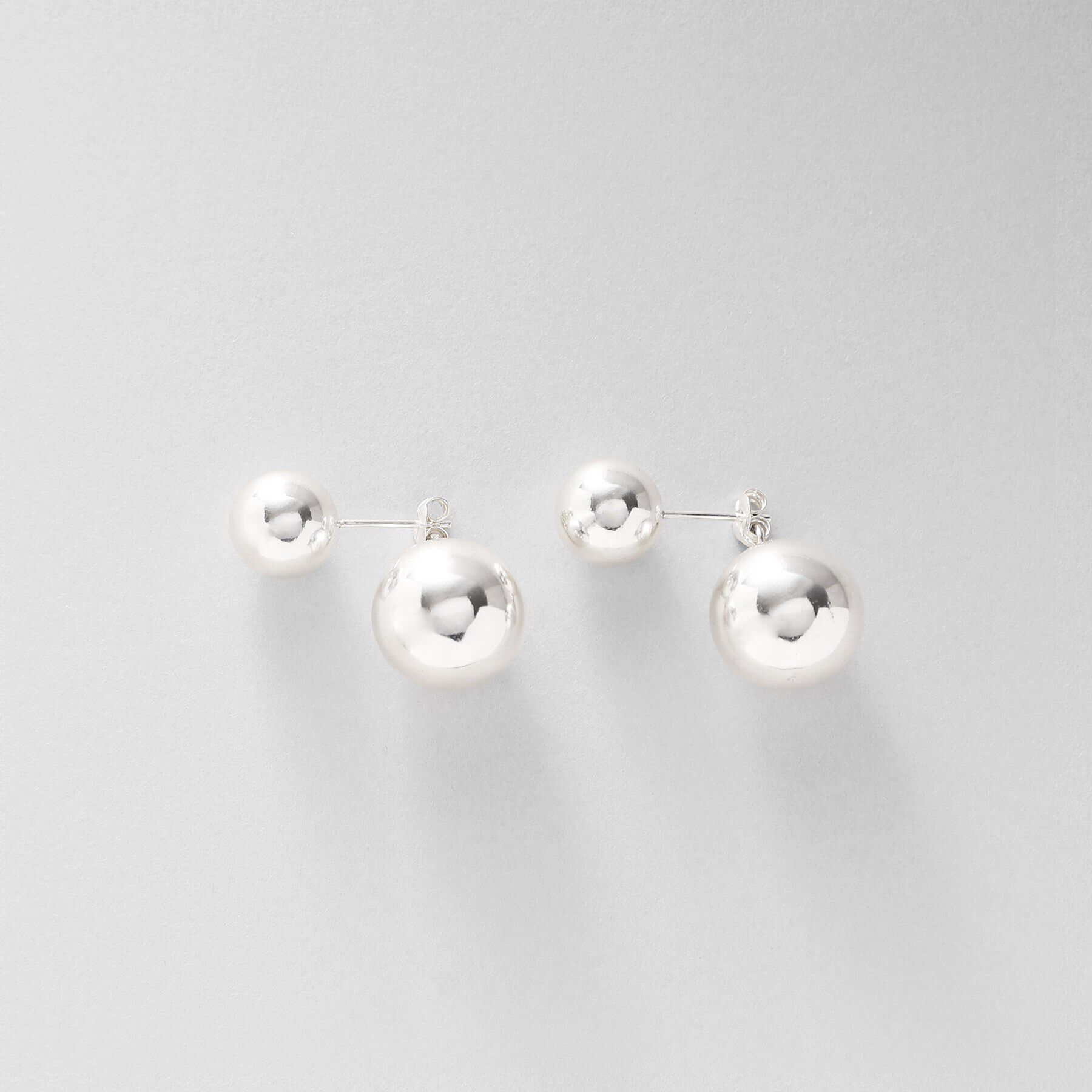 COCOSHNIK ONKITSCH「シルバー ホロウピアス ボール フロントバック」|ピアス|