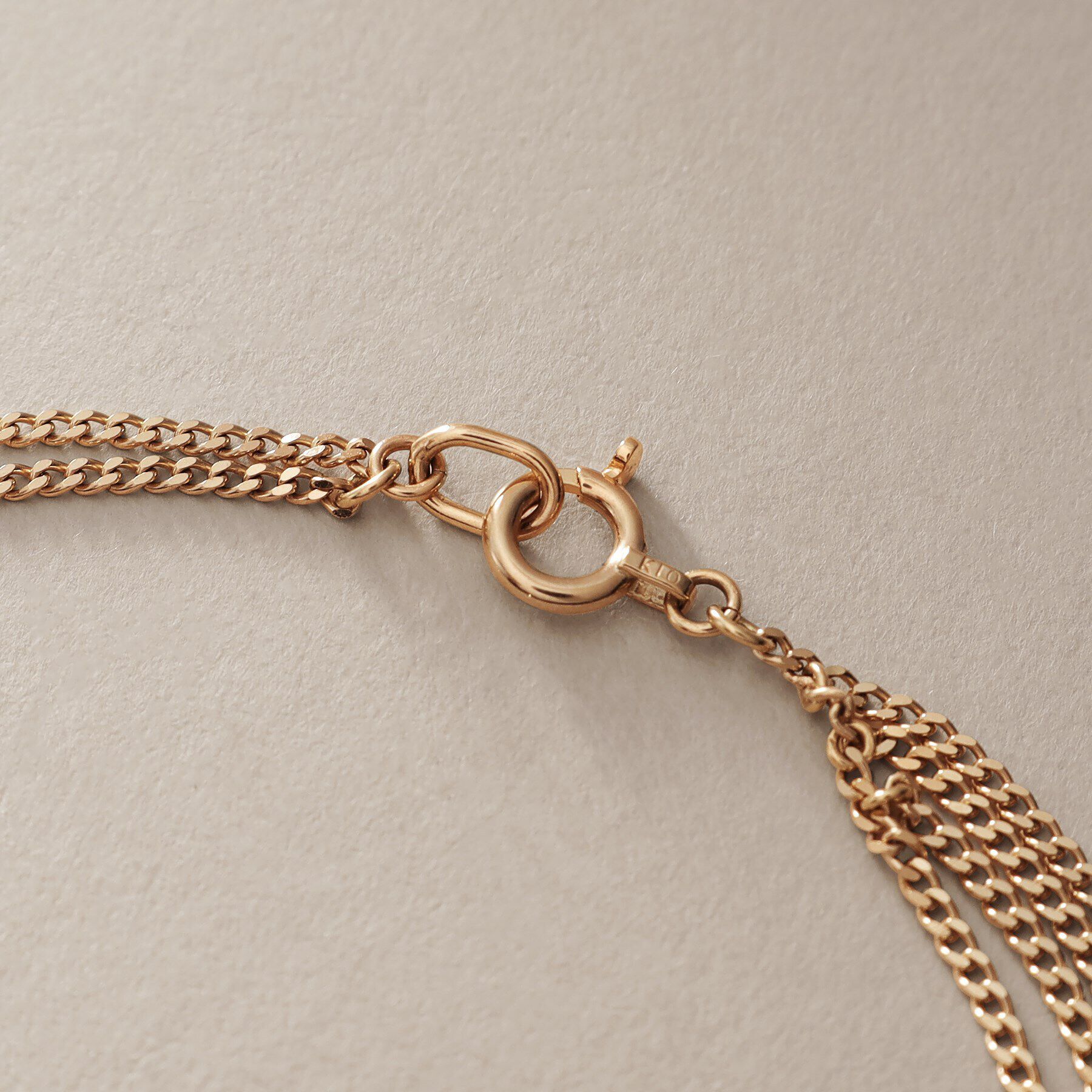 COCOSHNIK「K10キヘイアシンメトリードレープ ブレスレット」|ブレスレット・バングル|