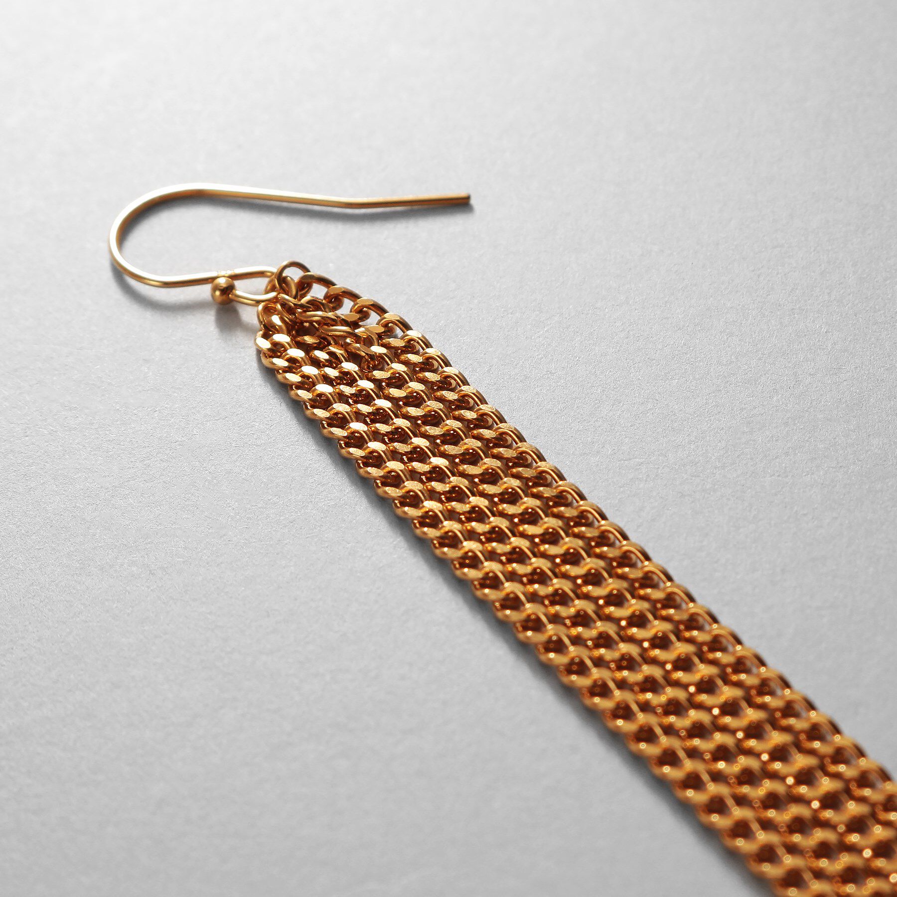 COCOSHNIK ONKITSCH「シルバー カーブチェーンフリンジピアス GP」|ピアス|