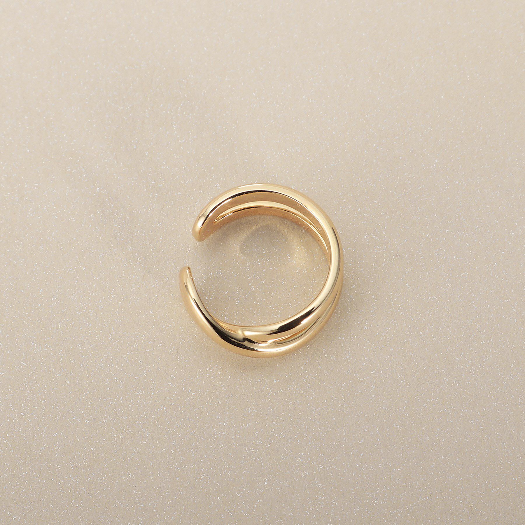 COCOSHNIK「K10ニュアンスクロスライン イヤーカフ」|イヤリング|