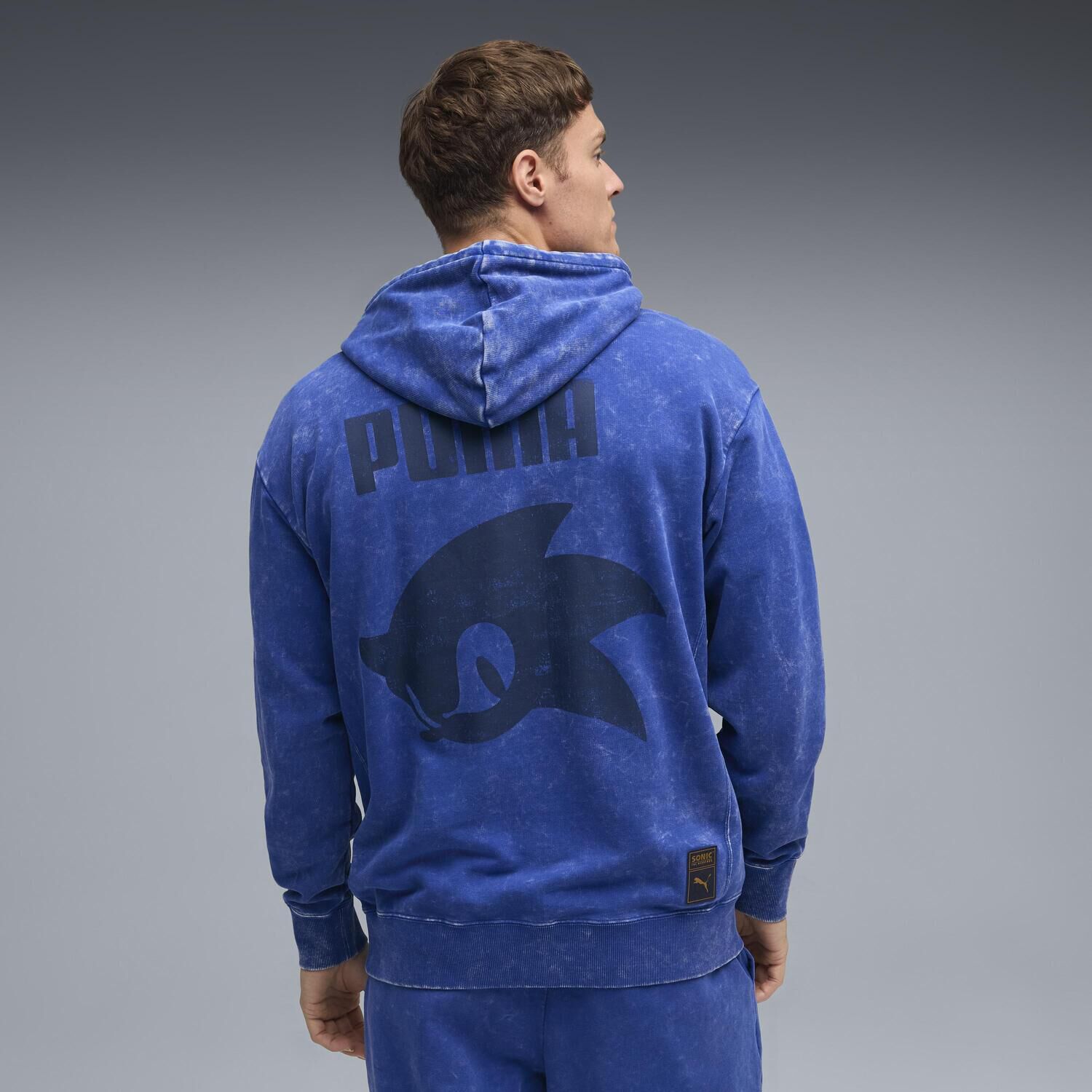 PUMA「【PUMA ｳｪｱ】M SONIC RELAXED GRAPHIC HOODIE」|ポロシャツ|