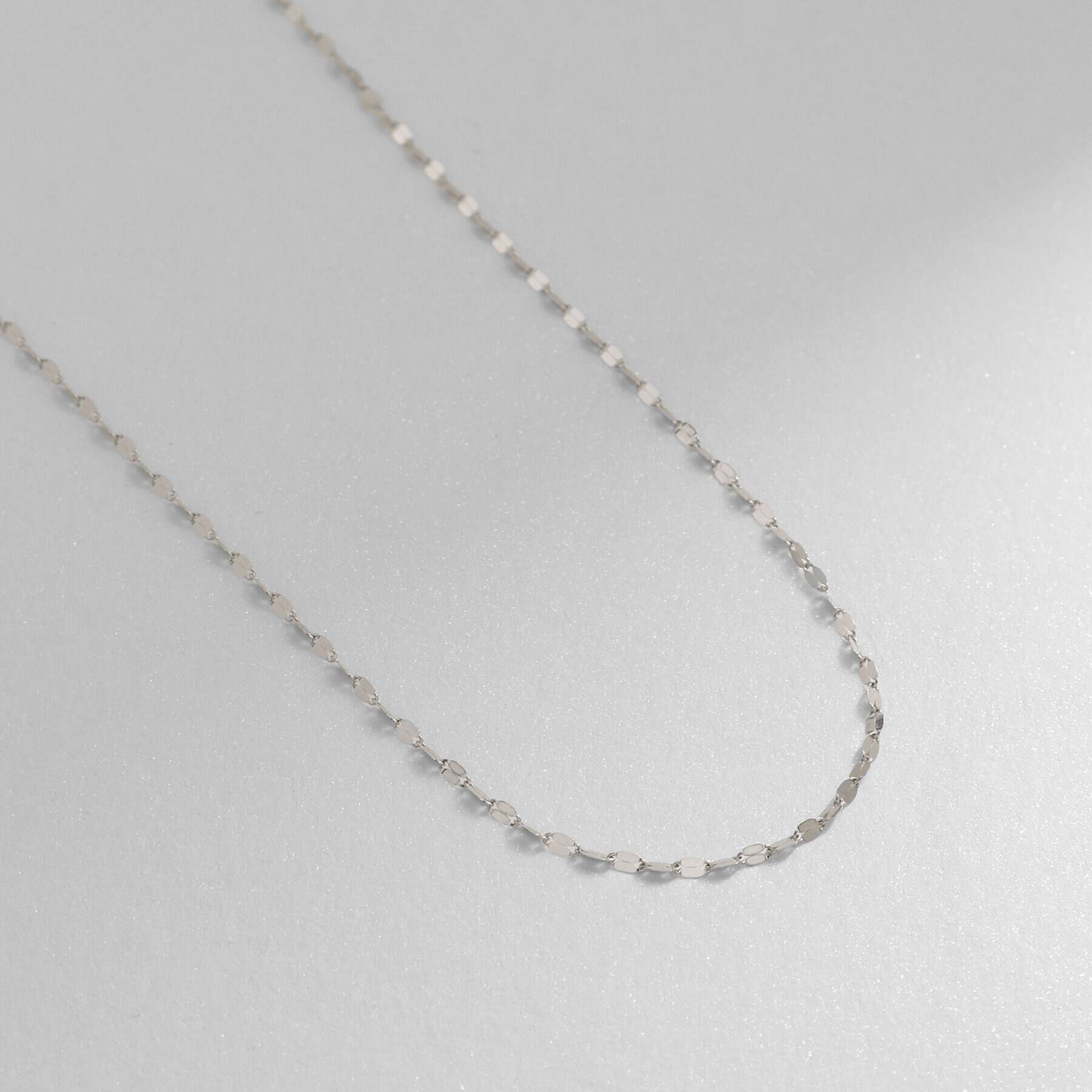 COCOSHNIK「プラチナ フラワークロスチェーン ネックレス」|ネックレス|