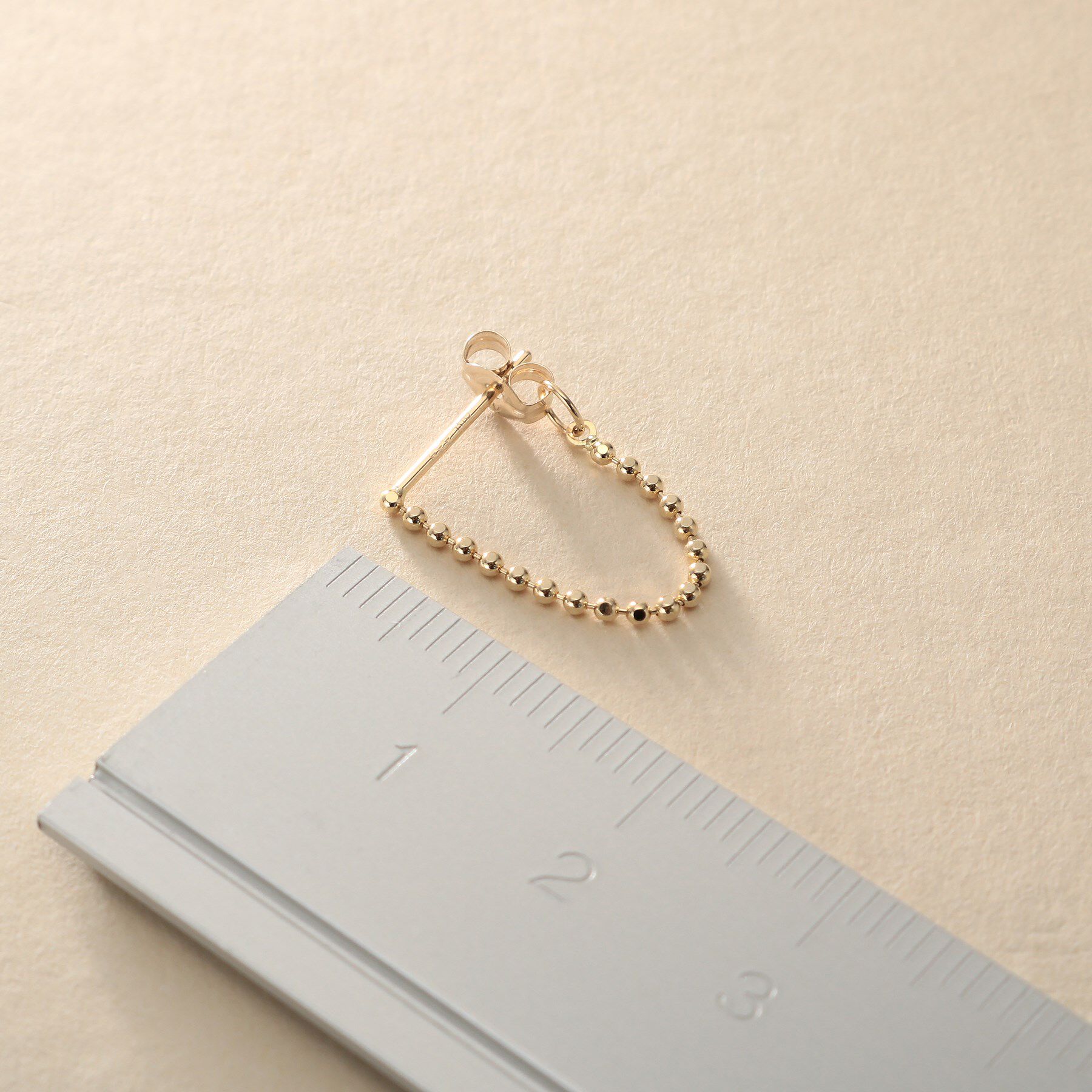 COCOSHNIK ONKITSCH「K10カットボールチェーン フープピアス」|ピアス|