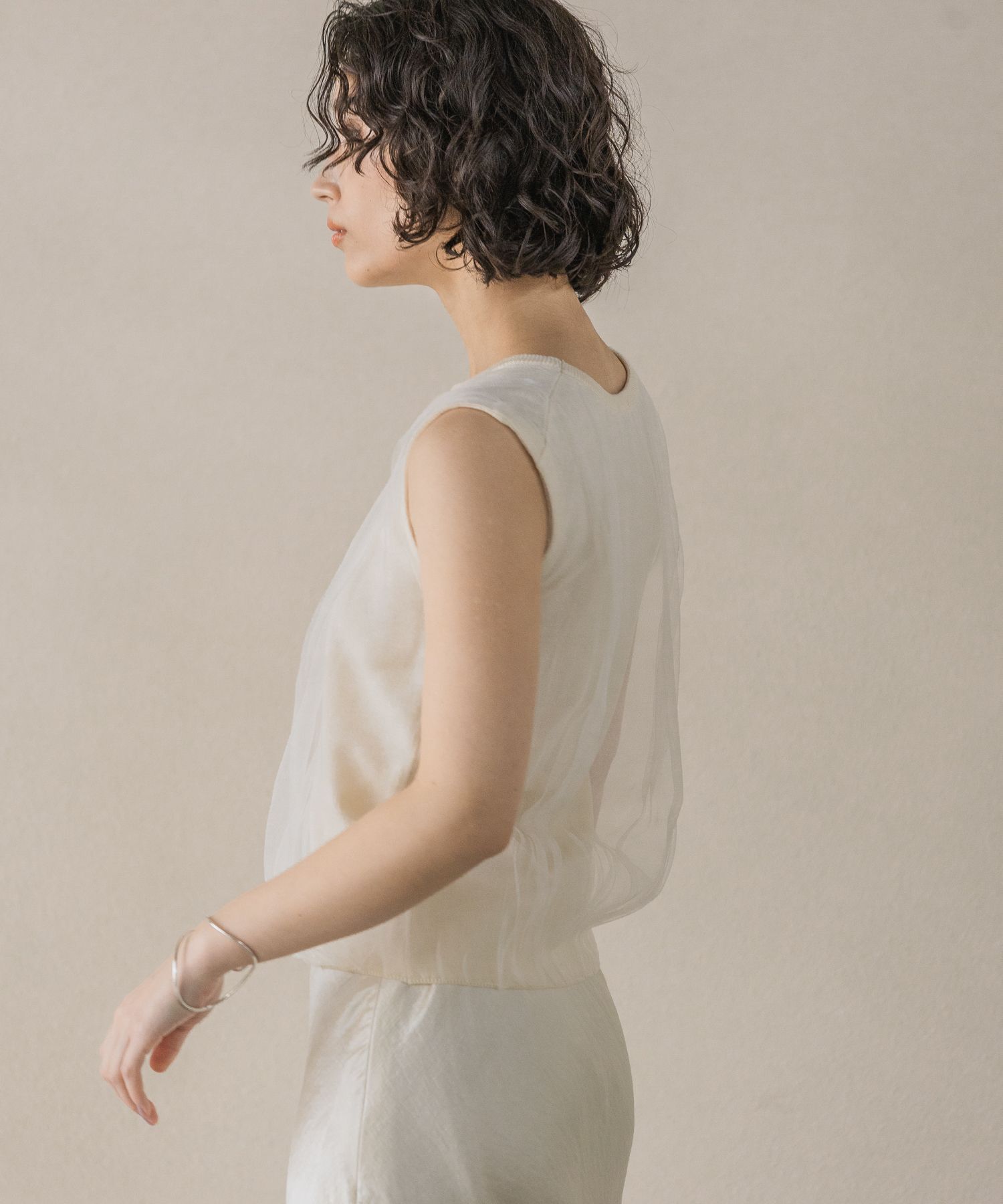 A part by 「ニットチュールレイヤー_ノースリーブ」|ニット・セーター|