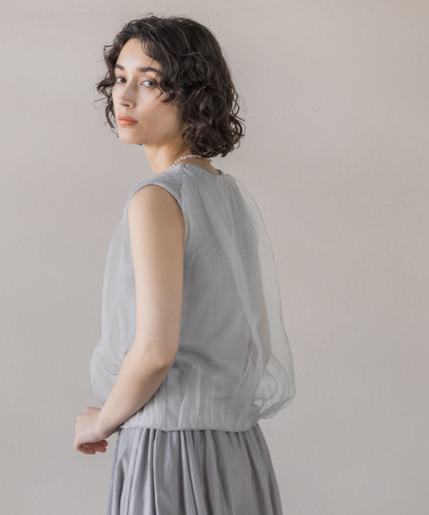 A part by 「ニットチュールレイヤー_ノースリーブ」|ニット・セーター|