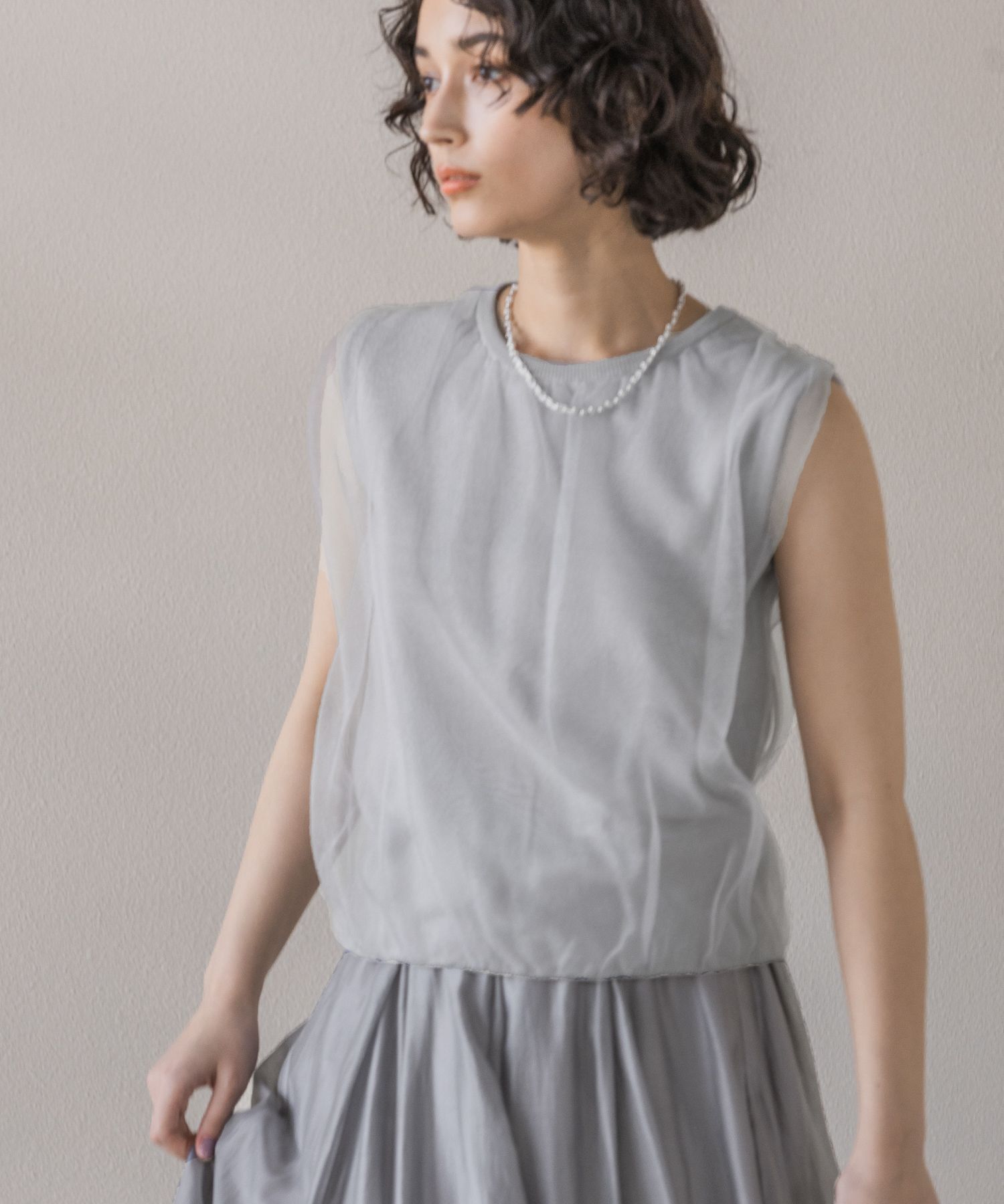 A part by 「ニットチュールレイヤー_ノースリーブ」|ニット・セーター|