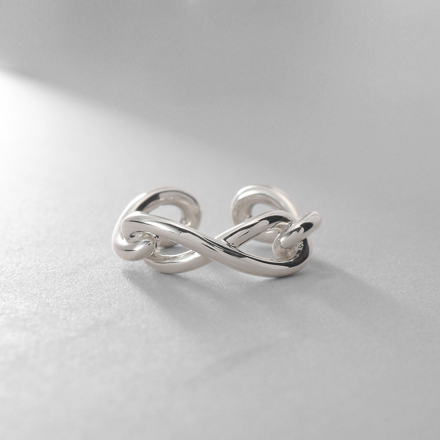 COCOSHNIK ONKITSCH「シルバー インフィニティイヤーカフ」|イヤリング|