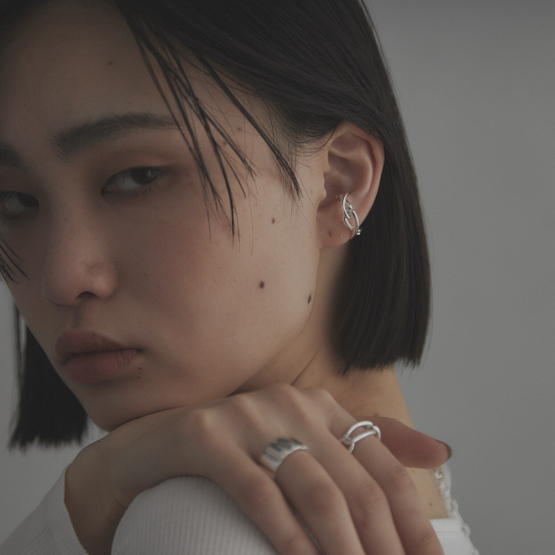 COCOSHNIK ONKITSCH「シルバー インフィニティイヤーカフ」|イヤリング|