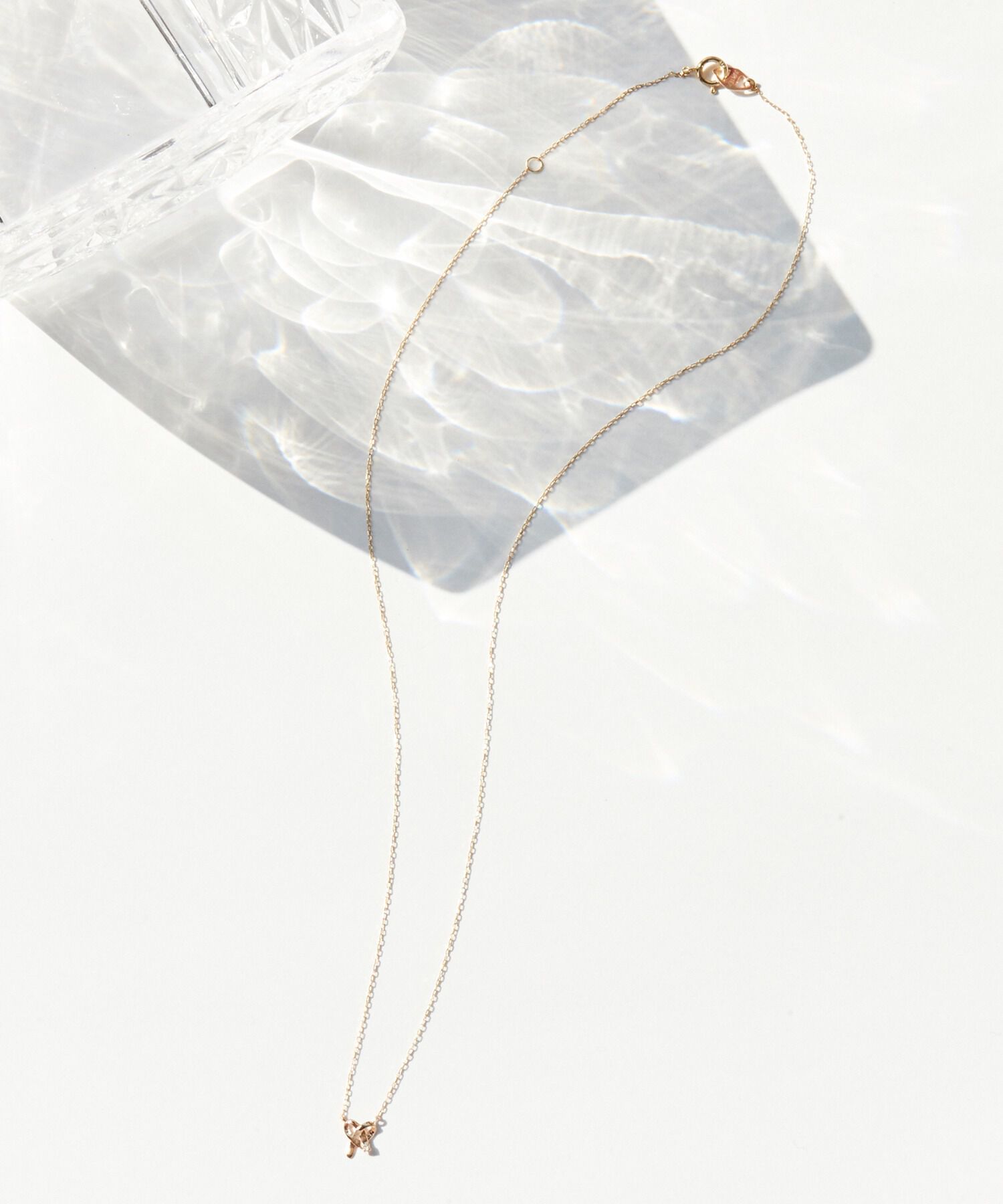 JUPITER「【K10】リボンモチーフダイヤモンドネックレス＜全長約40.5cm(調節した時の長さ37㎝)>」|ネックレス|