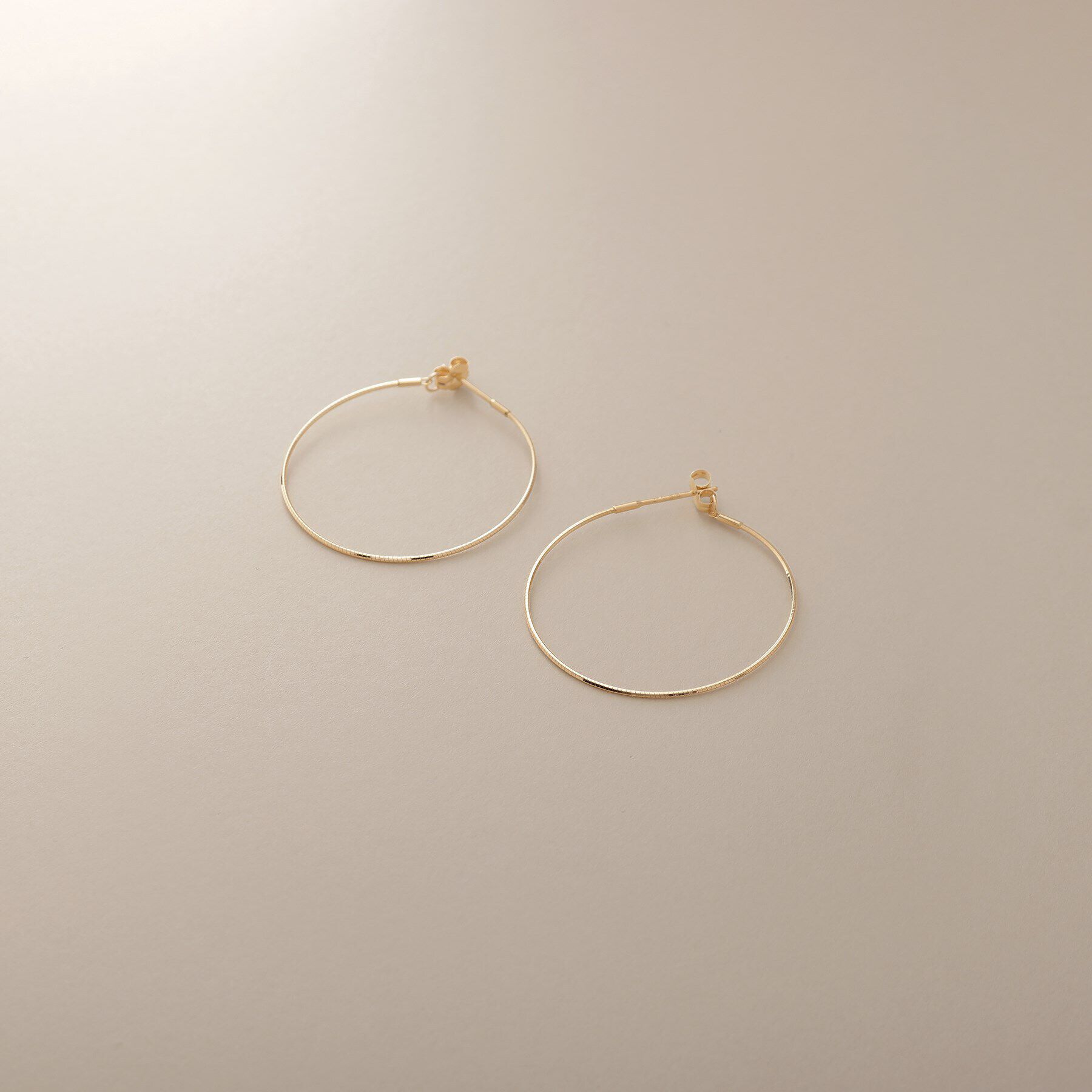 COCOSHNIK「K18オメガチェーン フープピアス中」|ピアス|