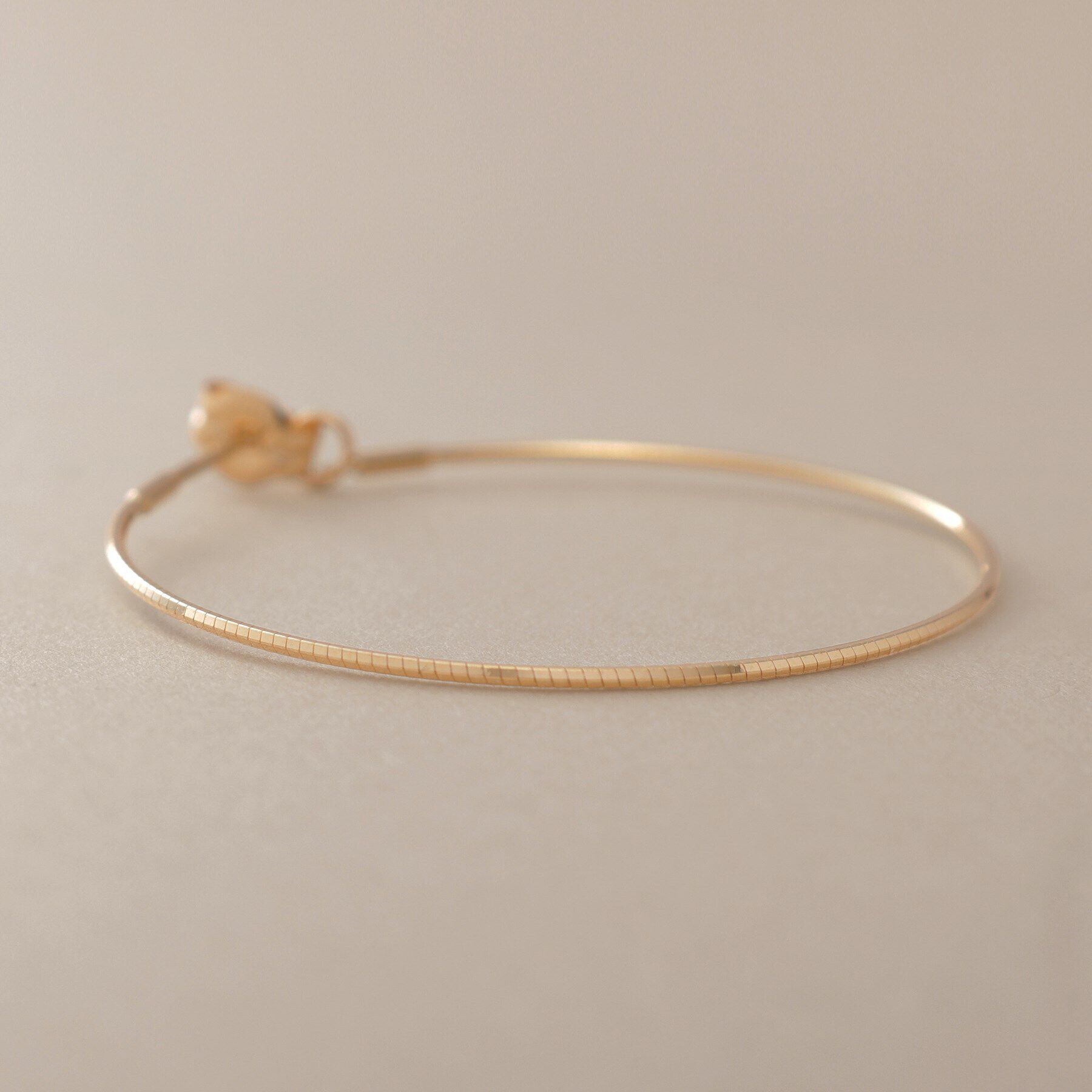 COCOSHNIK「K18オメガチェーン フープピアス中」|ピアス|