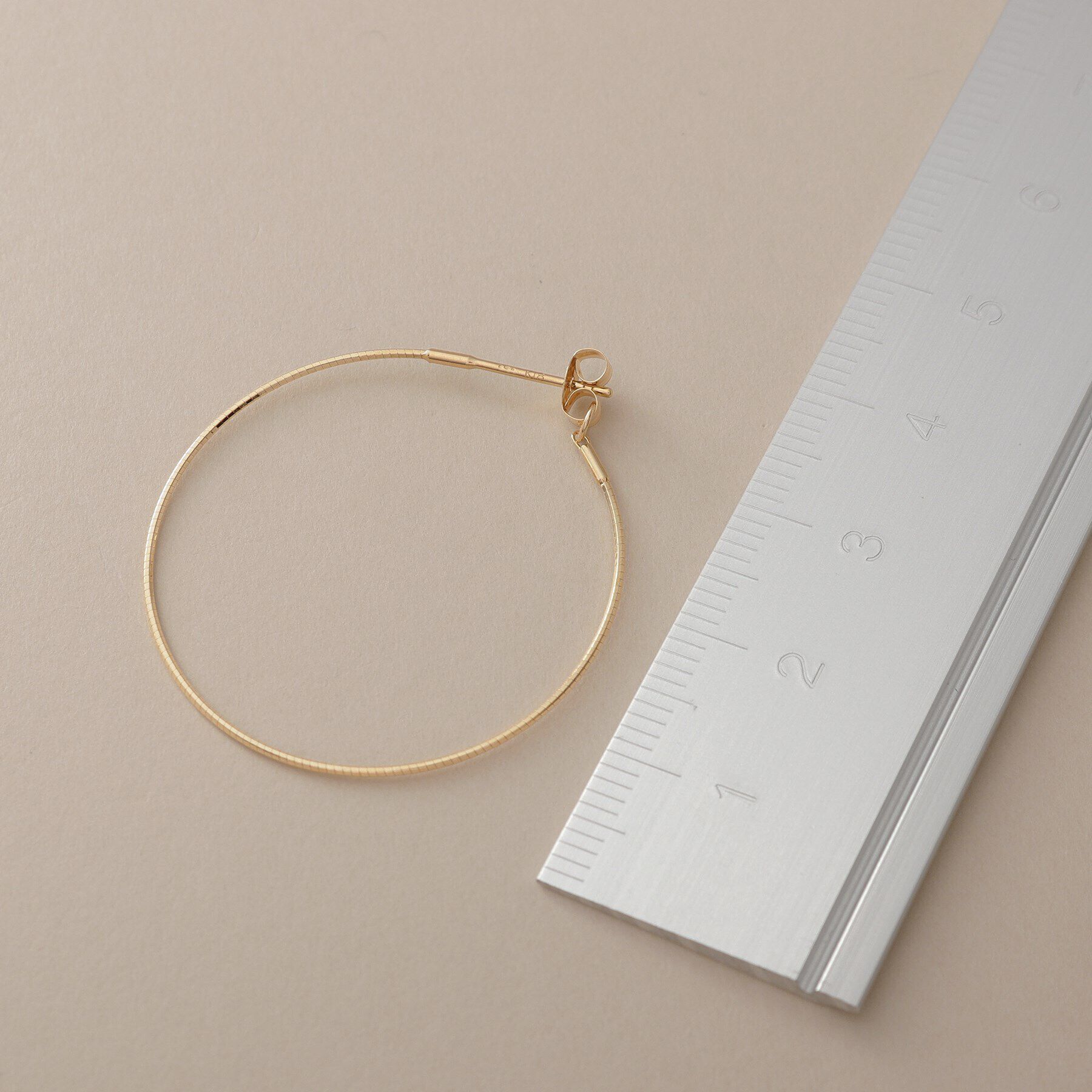 COCOSHNIK「K18オメガチェーン フープピアス中」|ピアス|