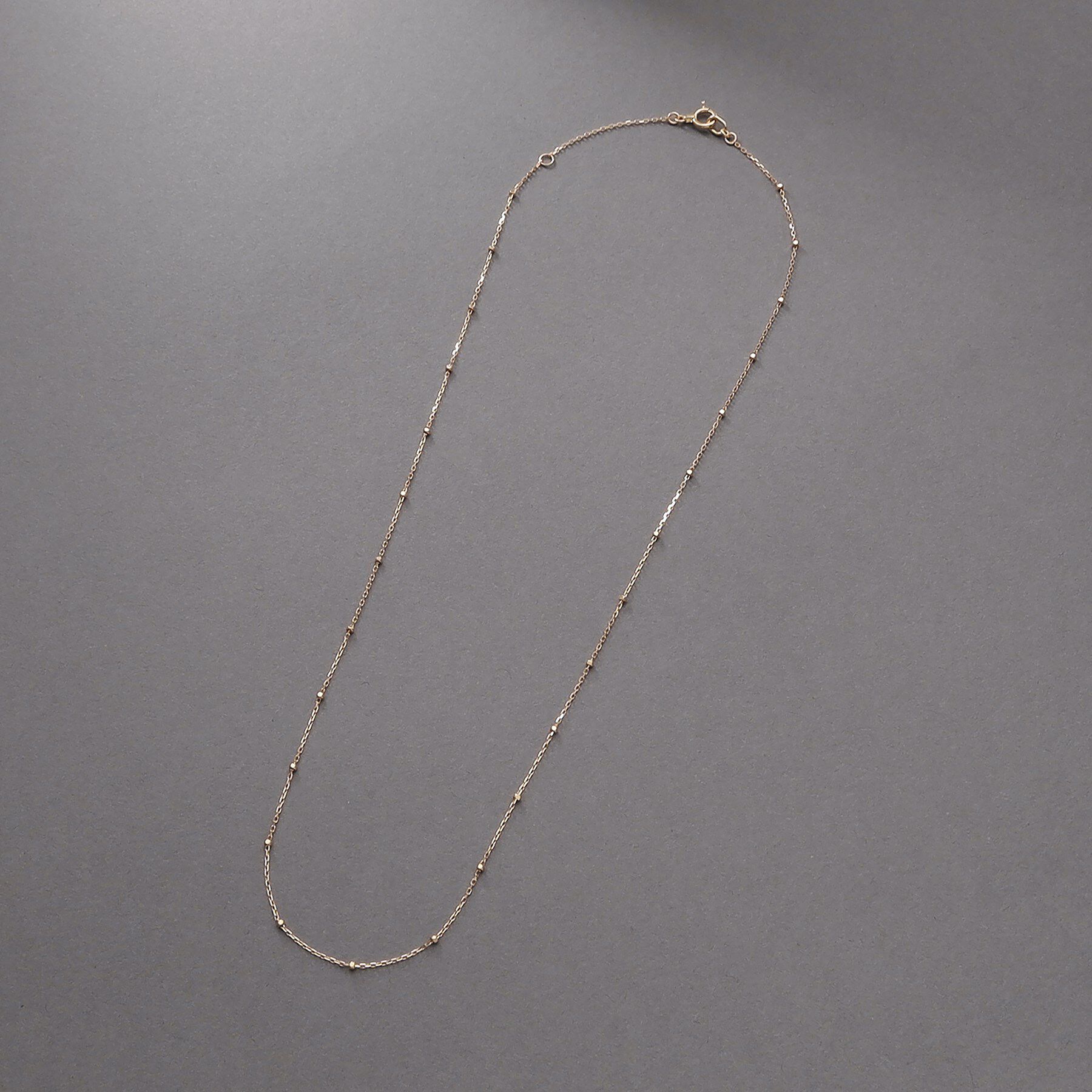 COCOSHNIK ONKITSCH「K10スキニーネックレス スタッドケーブル」|ネックレス|