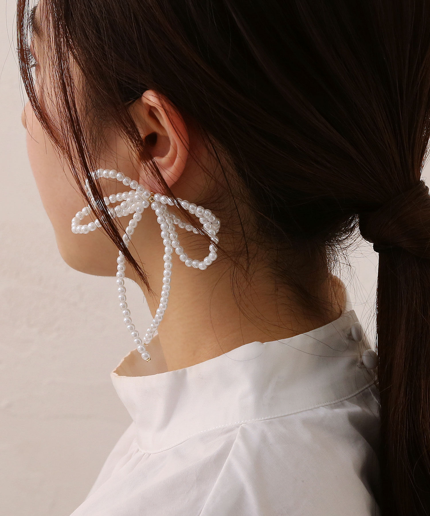  「ボリュームパールリボンイヤリング」|イヤリング|ホワイト