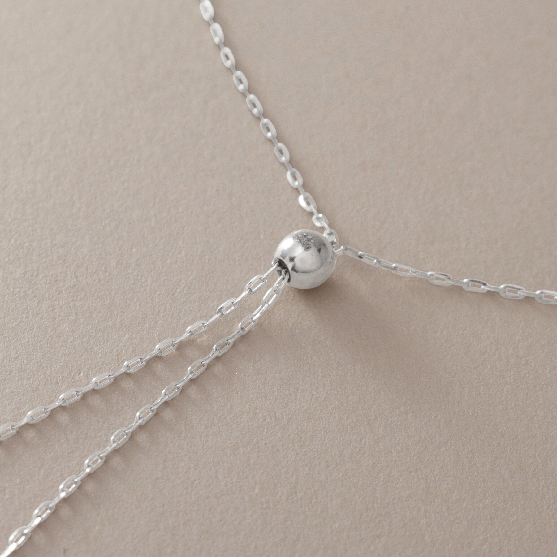 COCOSHNIK「プラチナ 中空ペアシェイプラリエット ネックレス」|ネックレス|