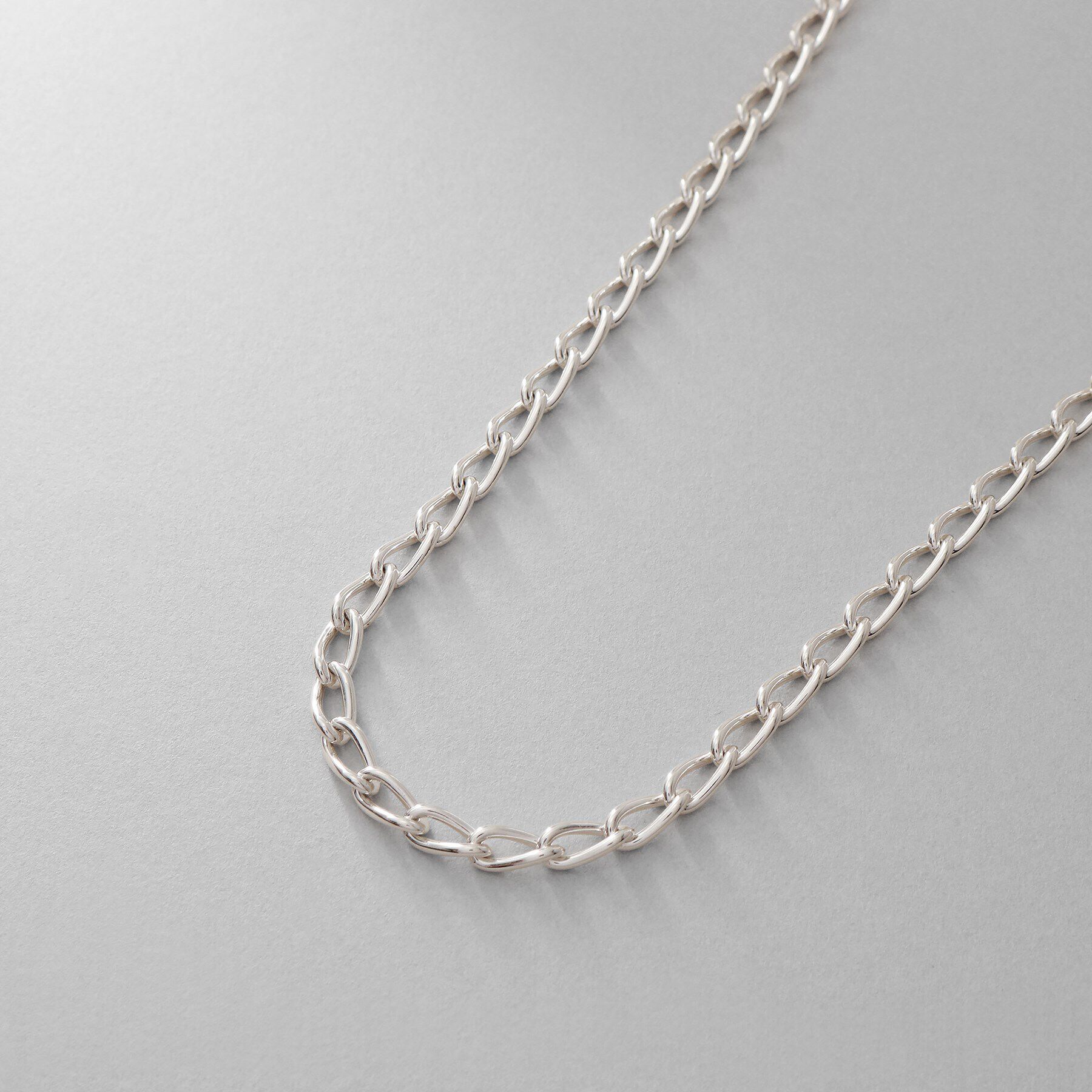 COCOSHNIK ONKITSCH「シルバー デザインチェーン ロングカーブネックレス」|ネックレス|