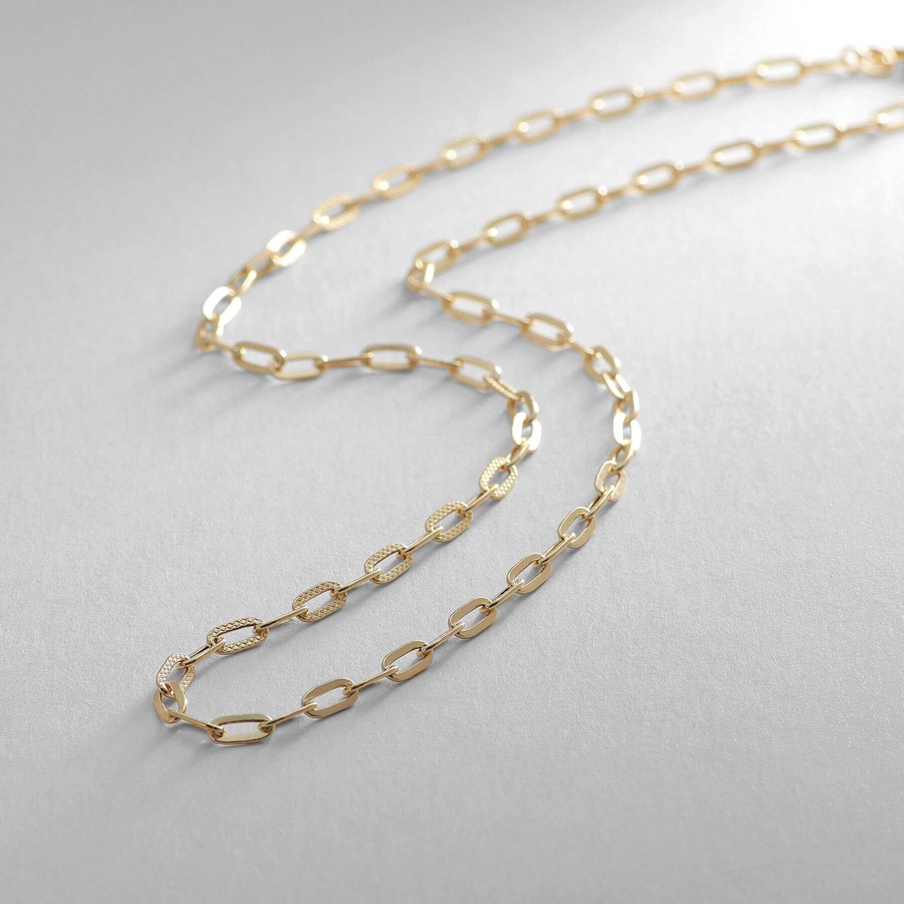 COCOSHNIK「K18中空プレイドケーブルチェーン ネックレス」|ネックレス|イエローゴールド(1