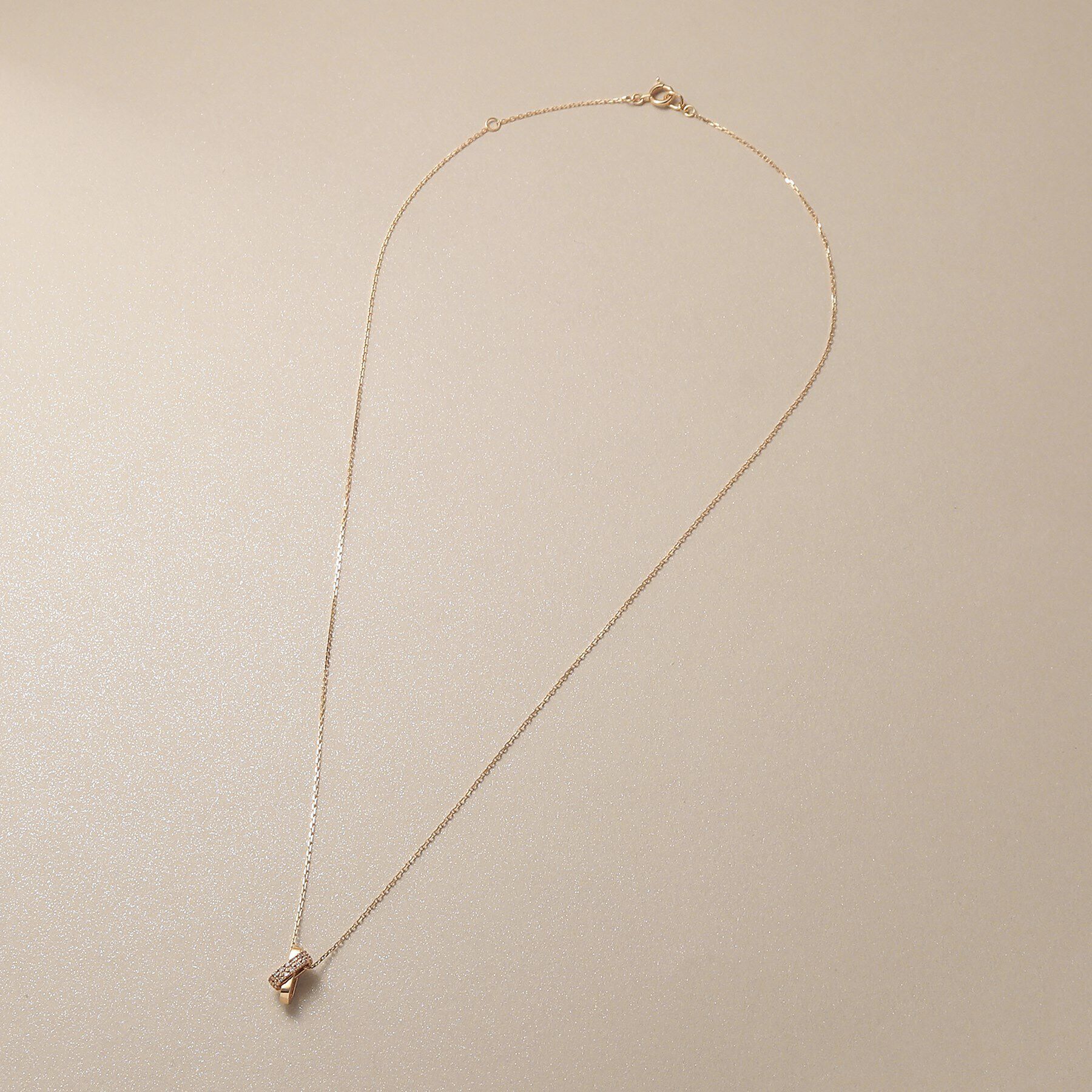 COCOSHNIK「K10ダイヤモンド アシンメトリークロス ネックレス」|ネックレス|