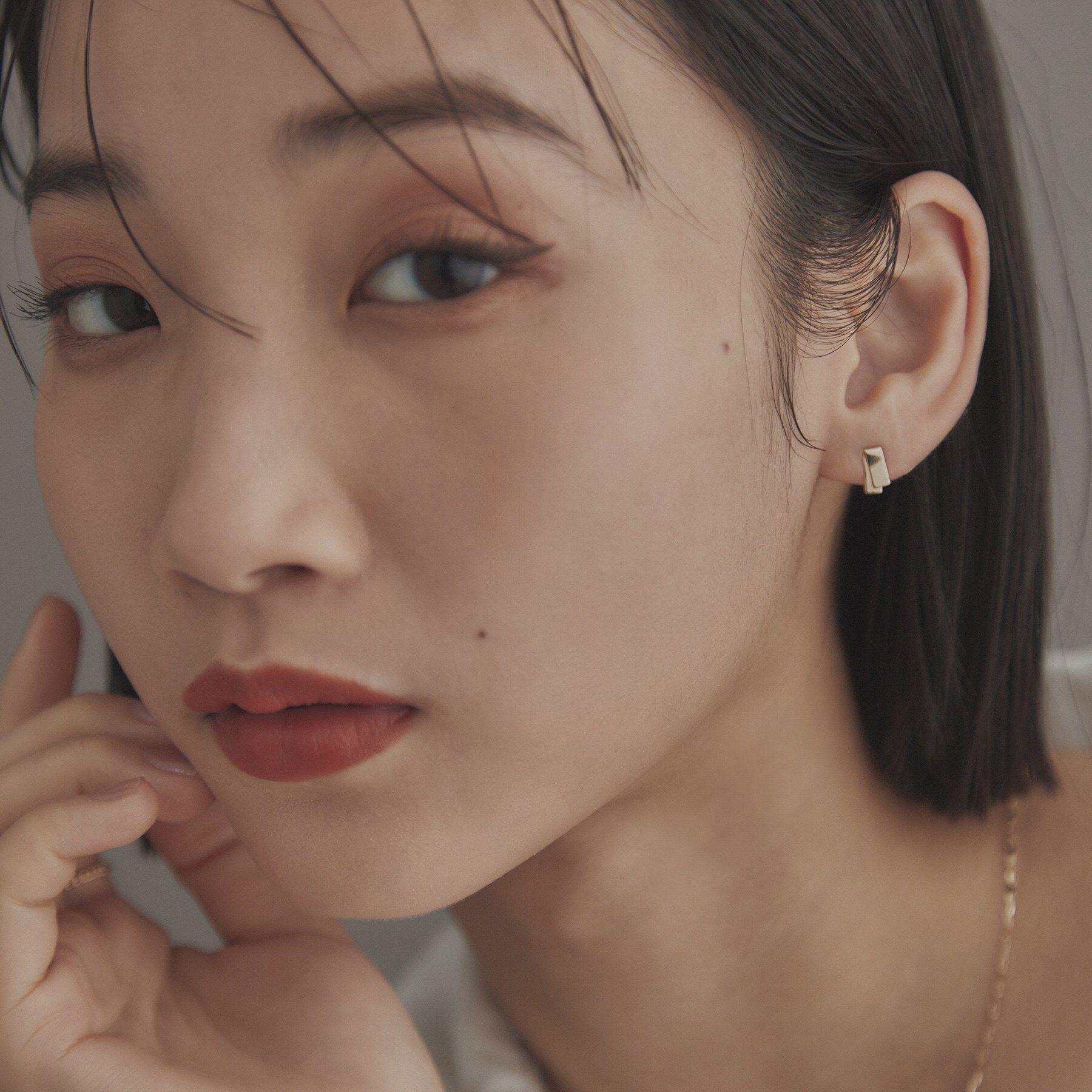 COCOSHNIK ONKITSCH「K10フラップリボンピアス」|ピアス|