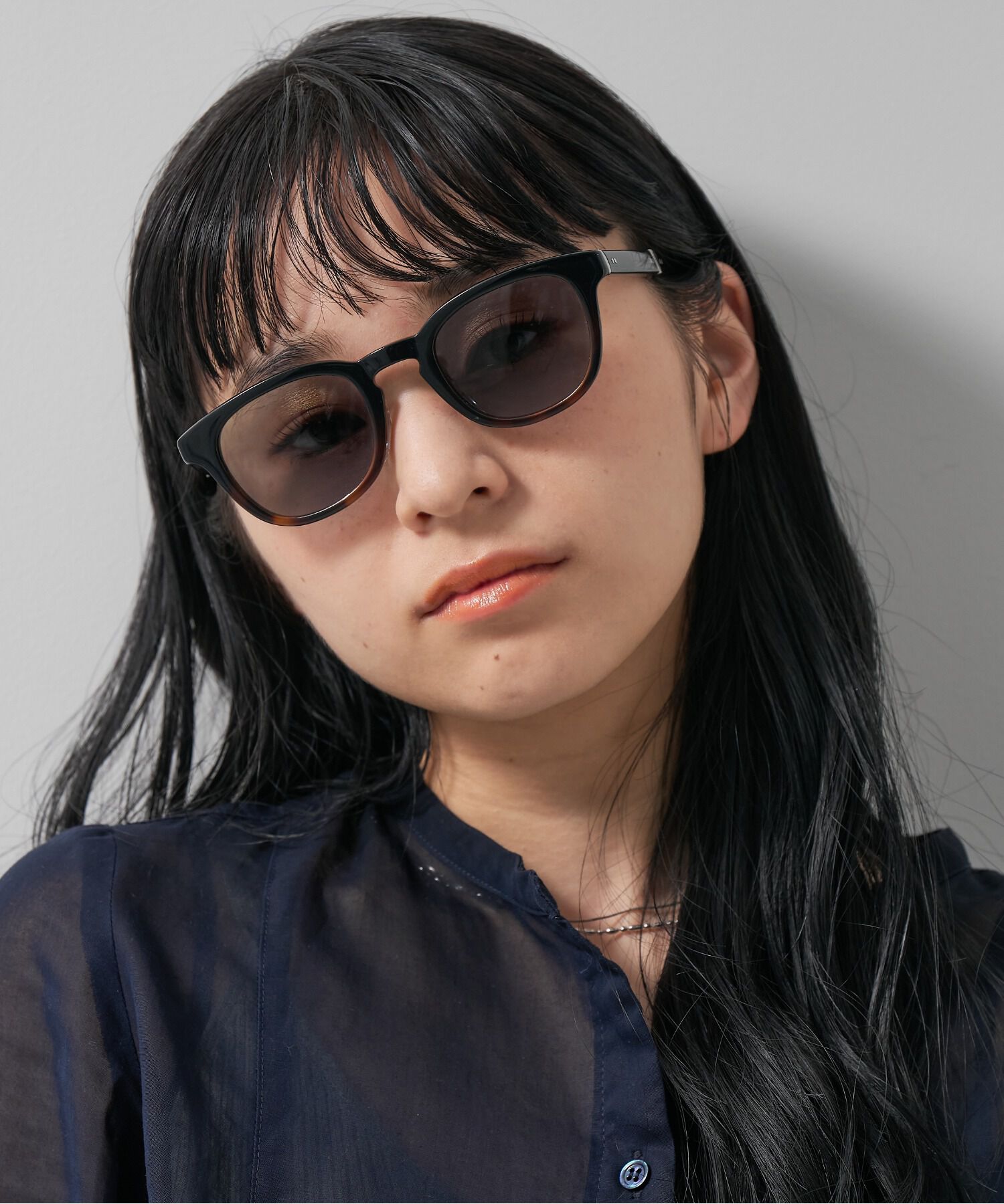  「ウェリントン型 調光サングラス 折りたたみ式｜レンズの色が変わるサングラス UNITED ARROWS Wellness」|サングラス|