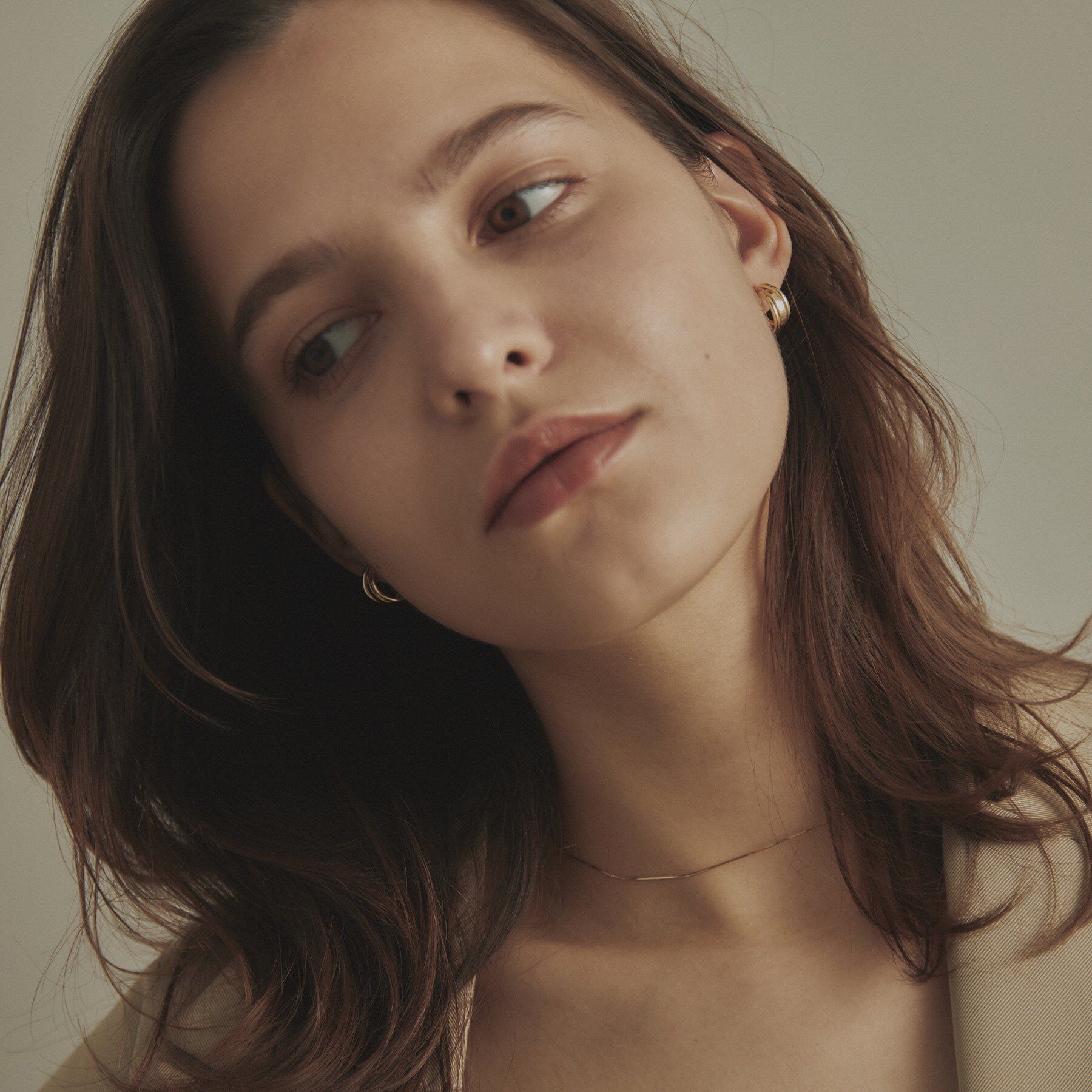 COCOSHNIK「K10甲丸トリプルツイストフープ スタッドピアス小」|ピアス|