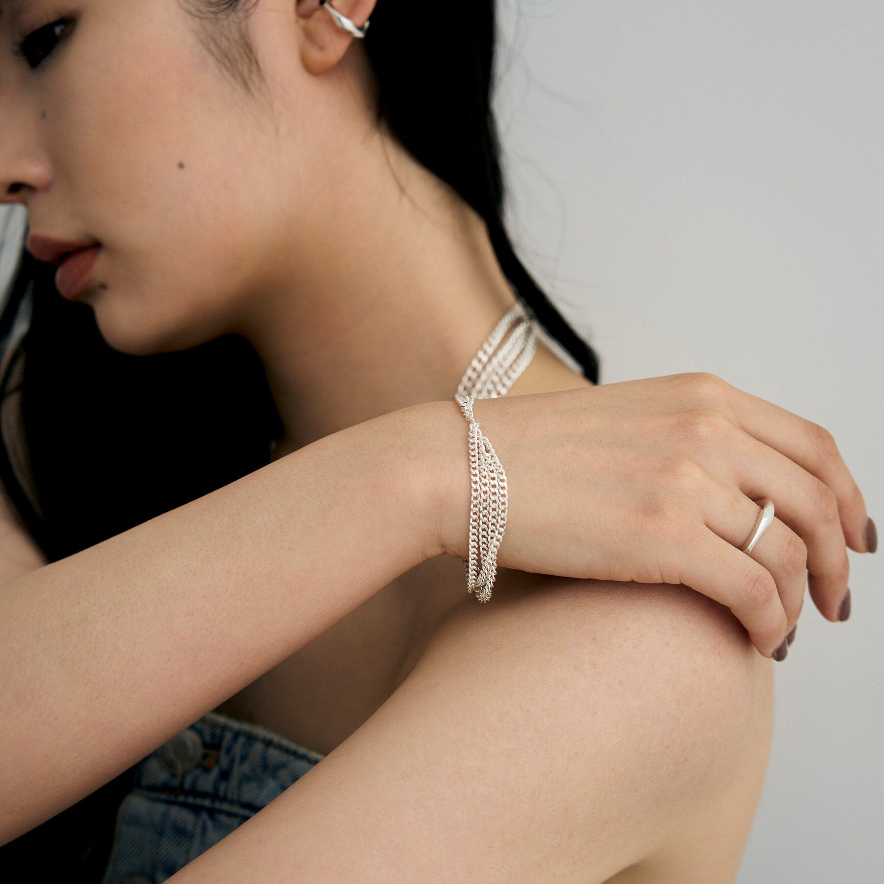 COCOSHNIK ONKITSCH「シルバー カーブチェーンアシンメトリードレープブレスレット」|ブレスレット・バングル|