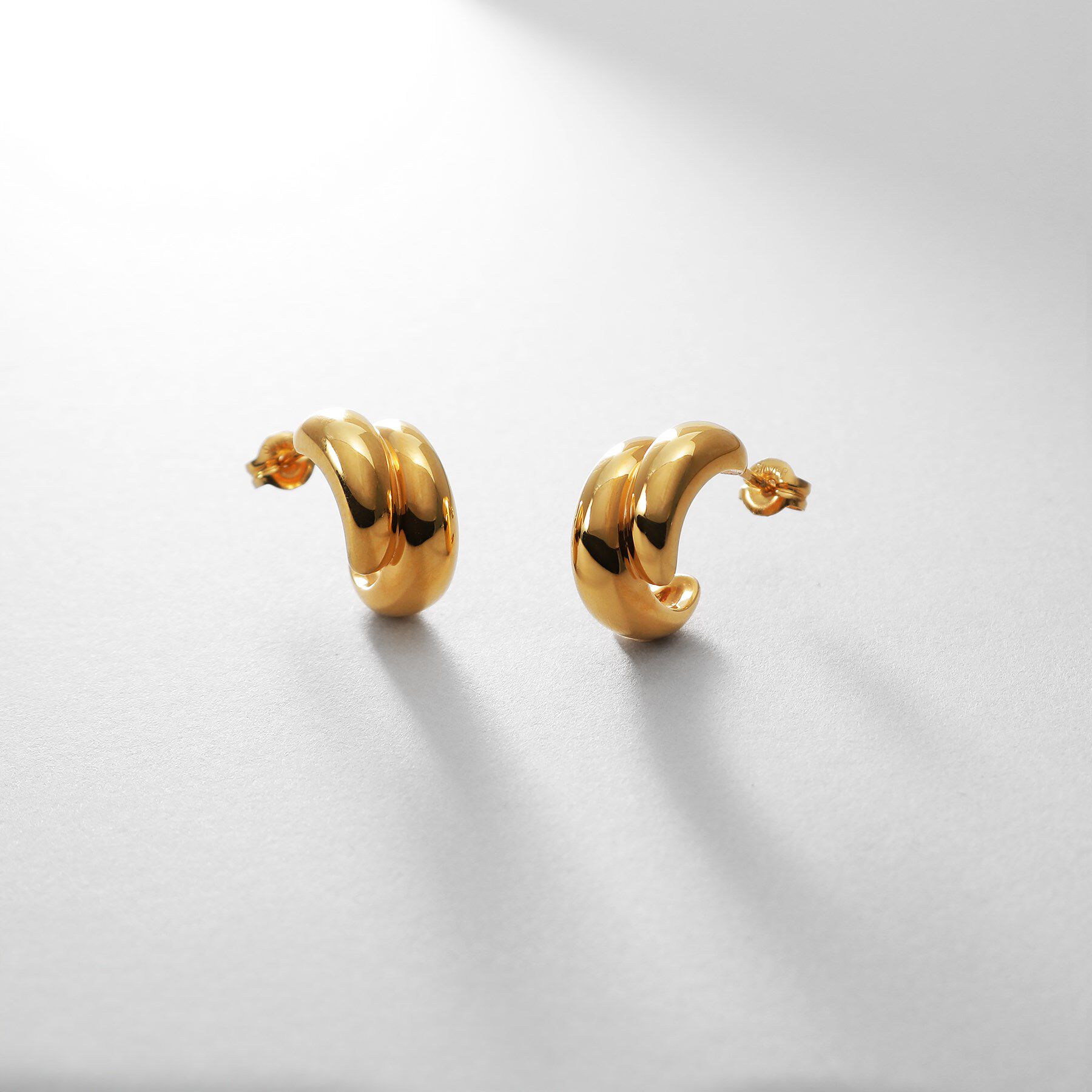 COCOSHNIK ONKITSCH「シルバー スモールフープ チャビーローテイテッドピアス GP」|ピアス|