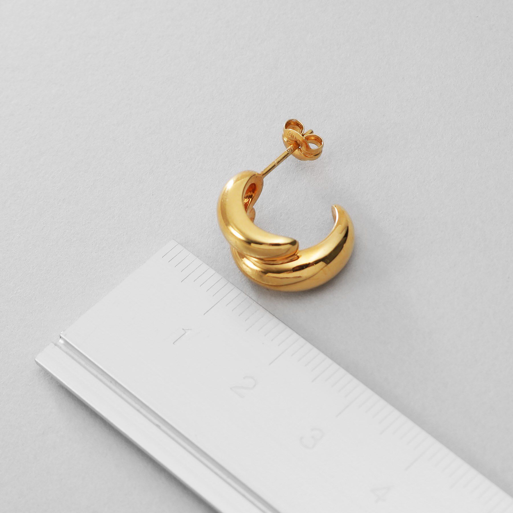 COCOSHNIK ONKITSCH「シルバー スモールフープ チャビーローテイテッドピアス GP」|ピアス|