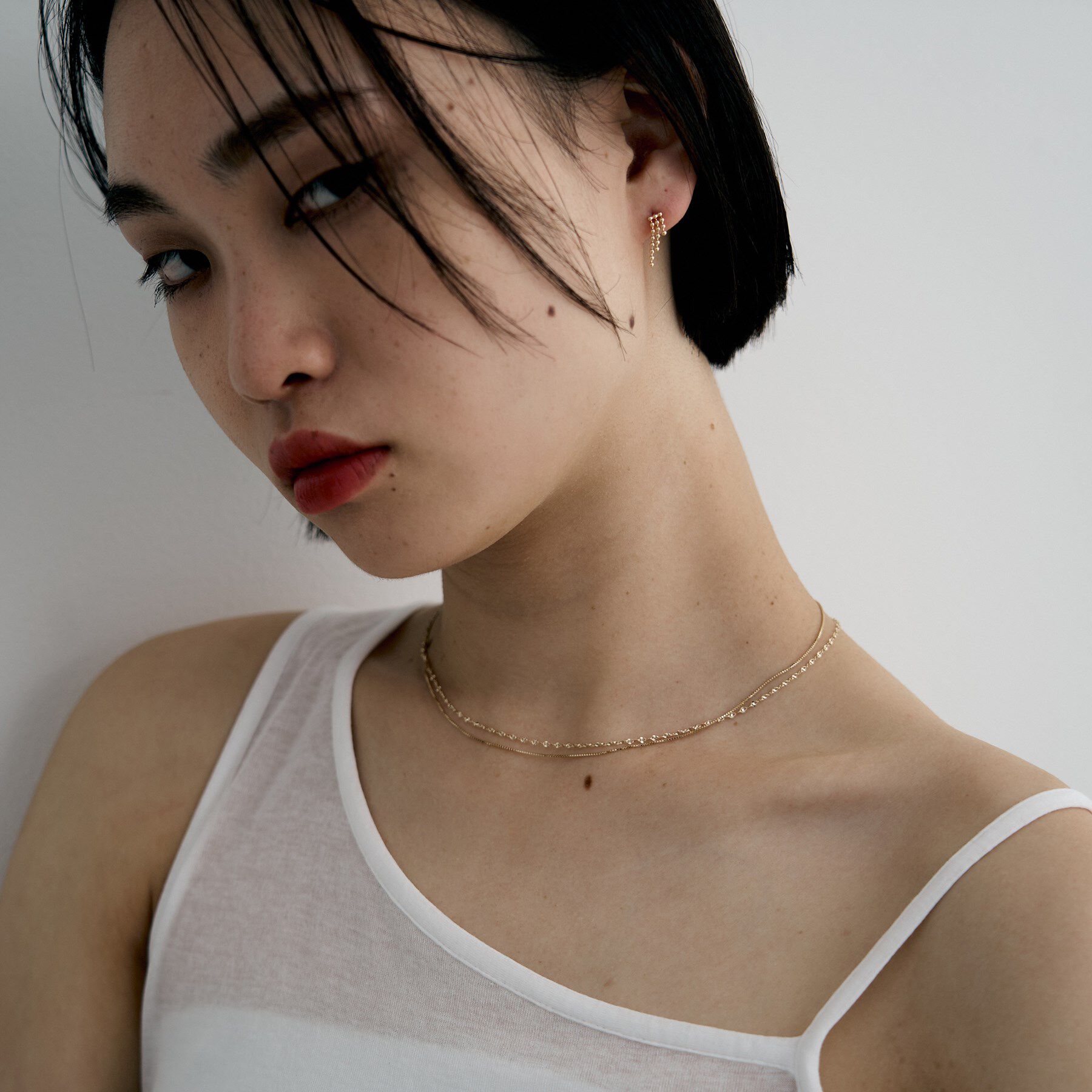 COCOSHNIK ONKITSCH「K10ティアボールチェーンピアス」|ピアス|