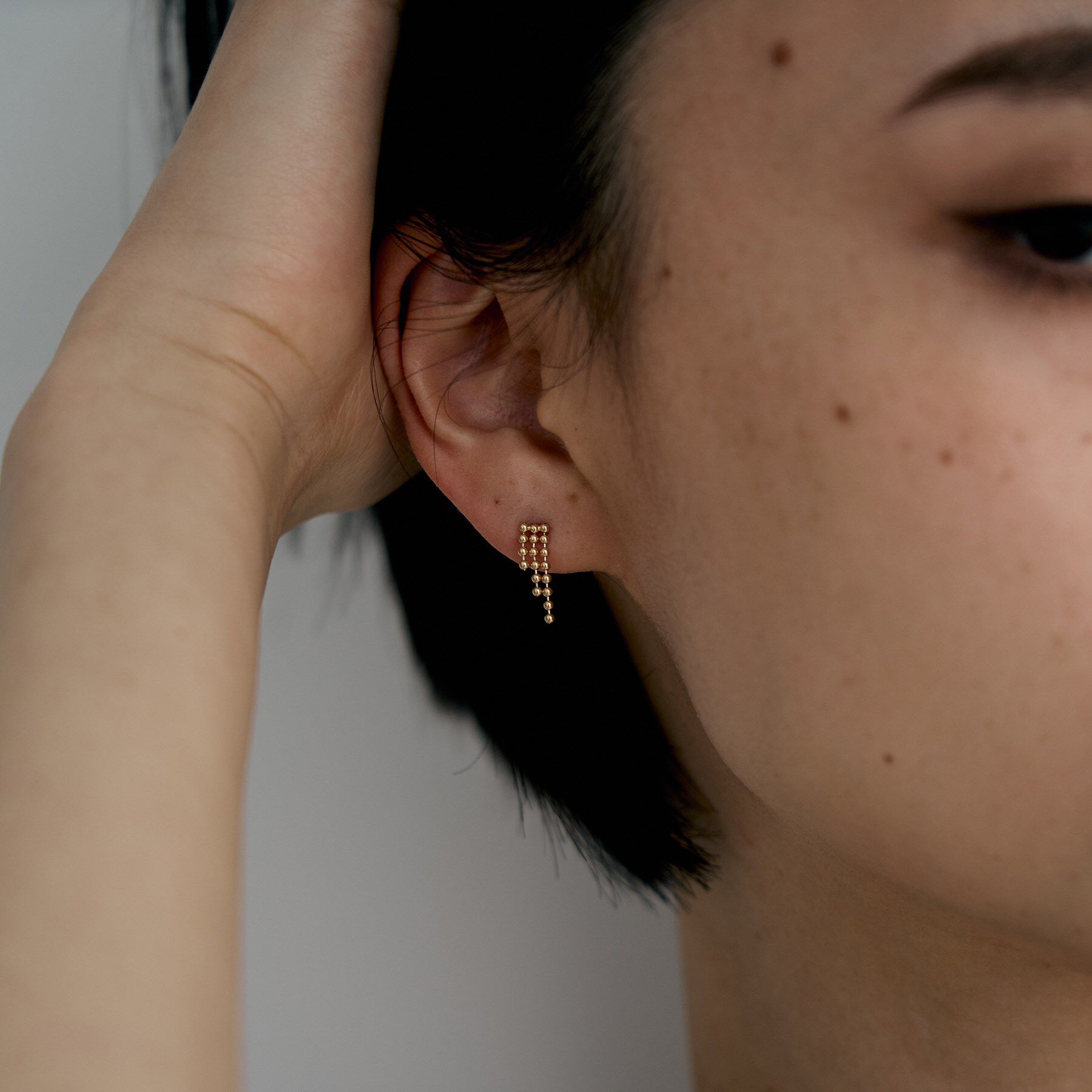 COCOSHNIK ONKITSCH「K10ティアボールチェーンピアス」|ピアス|