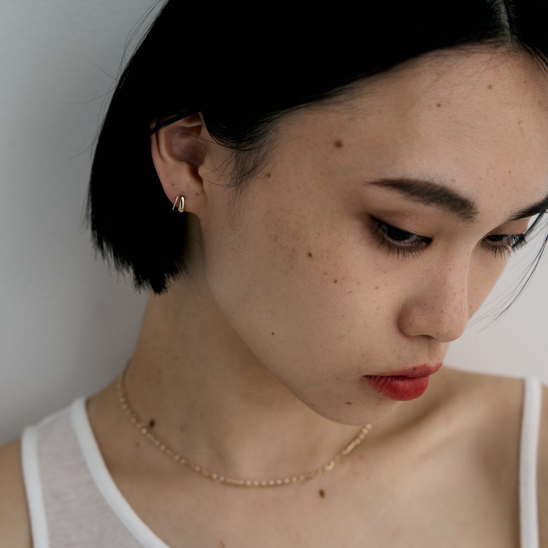 COCOSHNIK ONKITSCH「K10ブランチフープピアス」|ピアス|