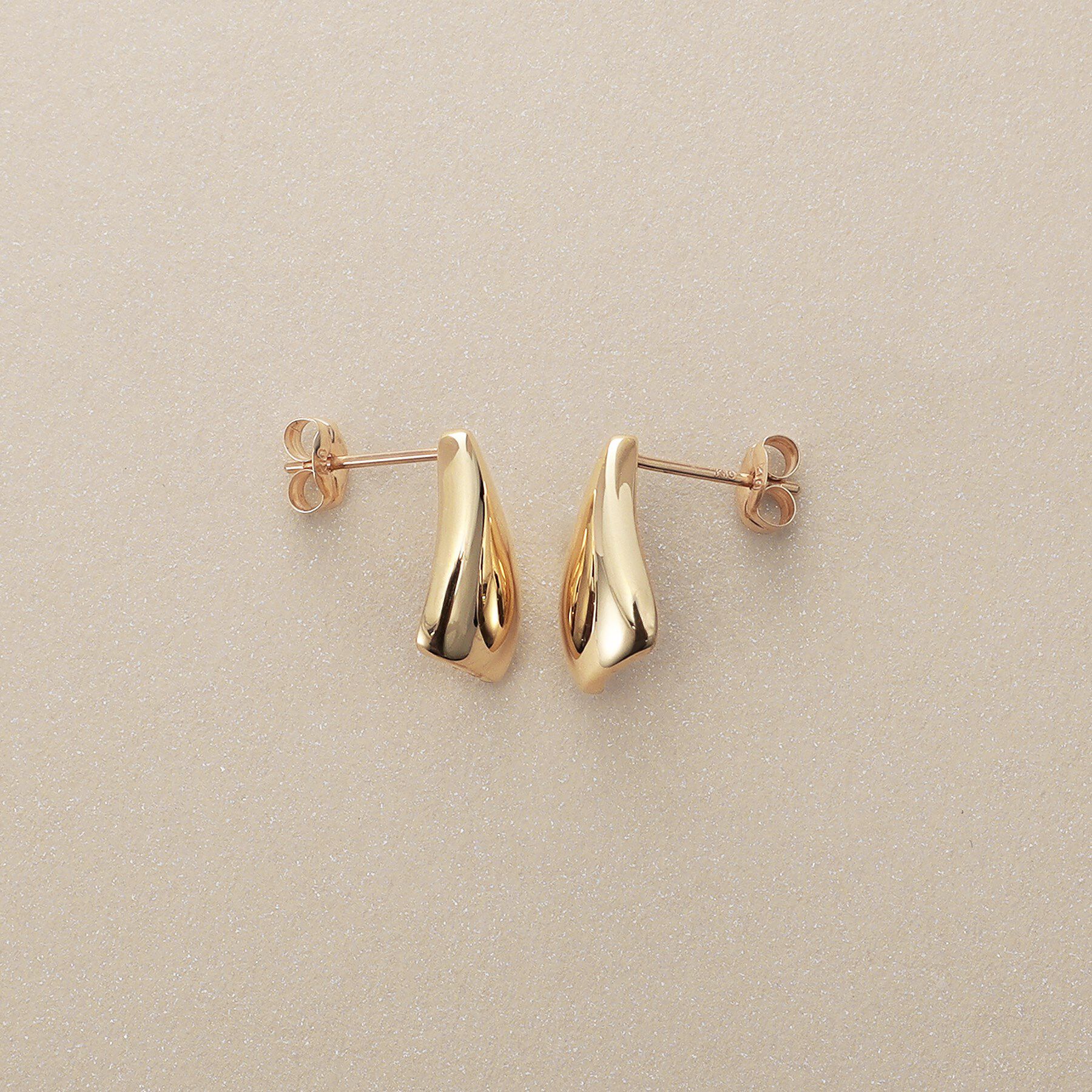 COCOSHNIK「K10甲丸ラップ スタッズピアス」|ピアス|