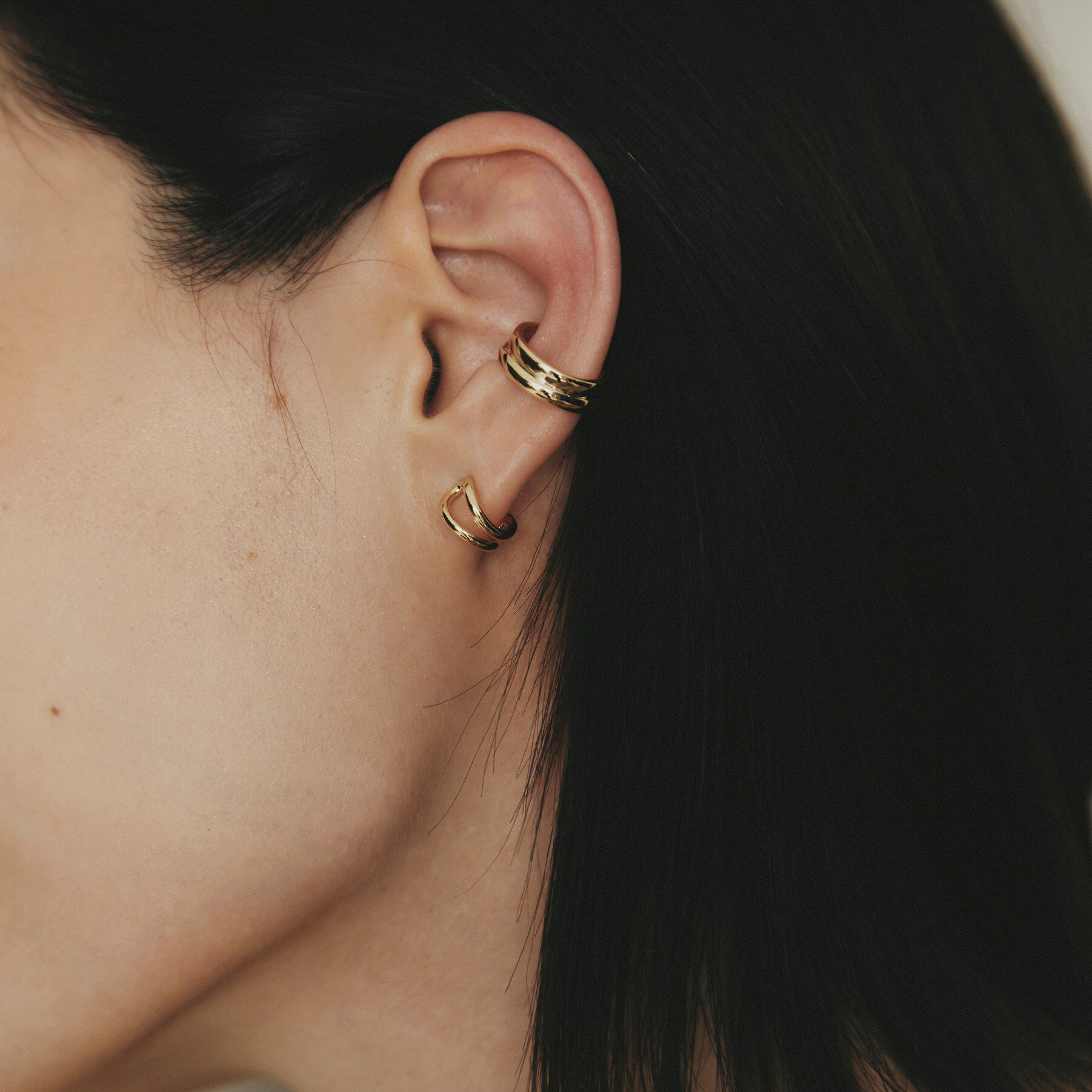 COCOSHNIK「K10ニュアンスループ スタッドピアス」|ピアス|