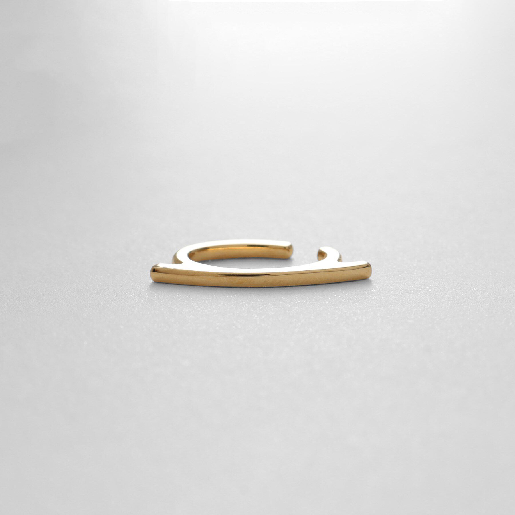 COCOSHNIK ONKITSCH「シルバー ソリッドイヤーカフ フラットアーク GP」|イヤリング|