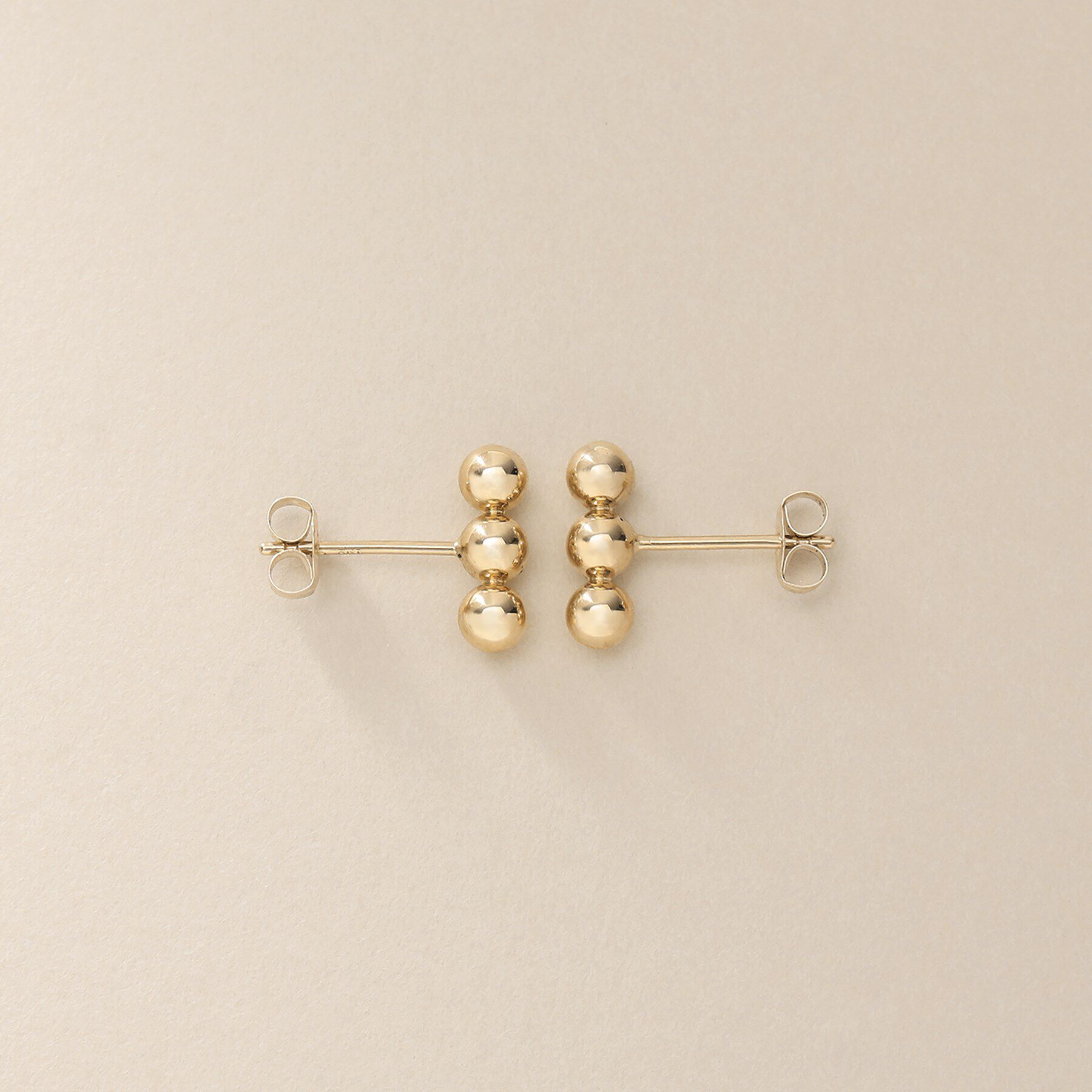 COCOSHNIK「K10中空ボールバー スタッドピアス」|ピアス|