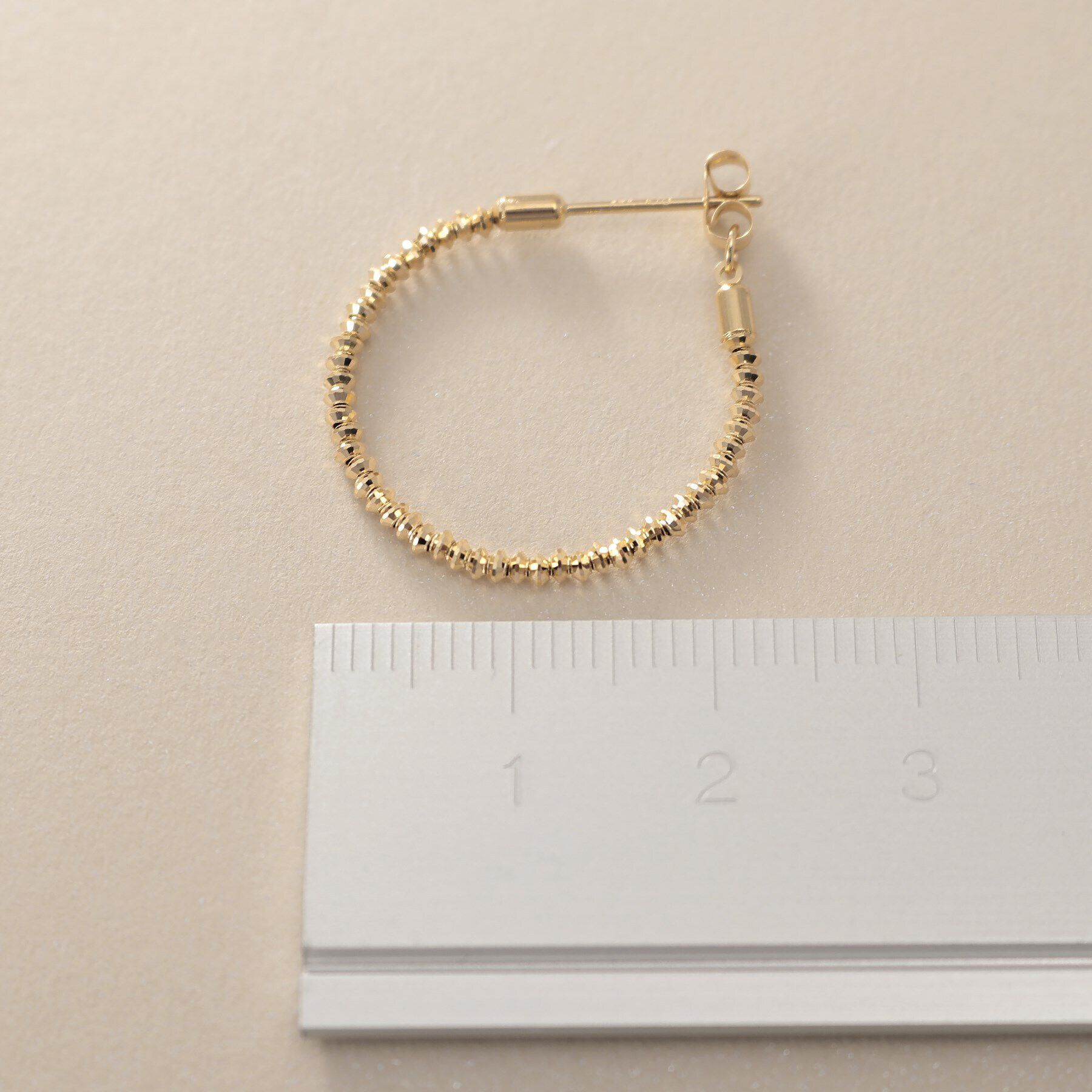 COCOSHNIK「K18カットビーズ フープピアス」|ピアス|