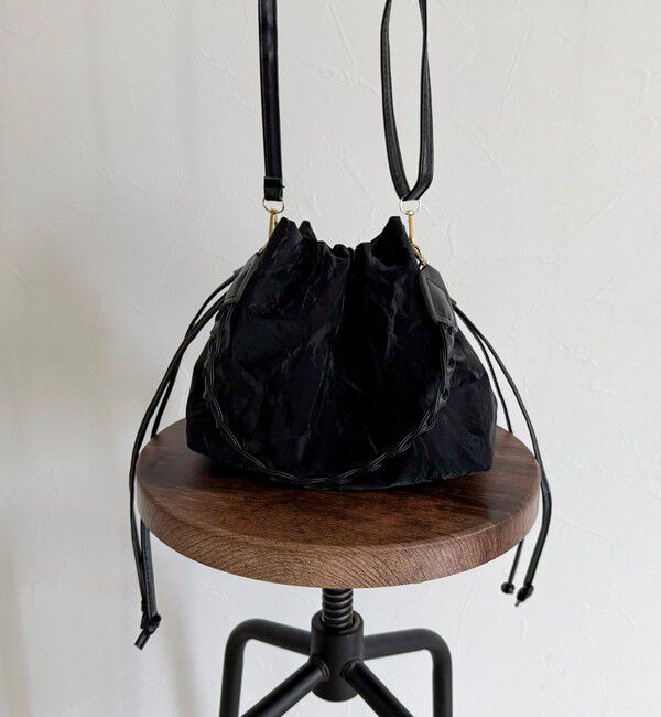 fredy emue「三つ編みハンドル巾着バッグ」|ショルダー・メッセンジャー|