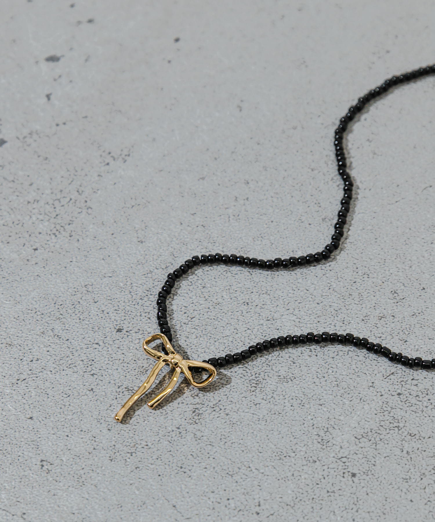 SMELLY「ビーズメタルリボントップネックレス」|ネックレス|