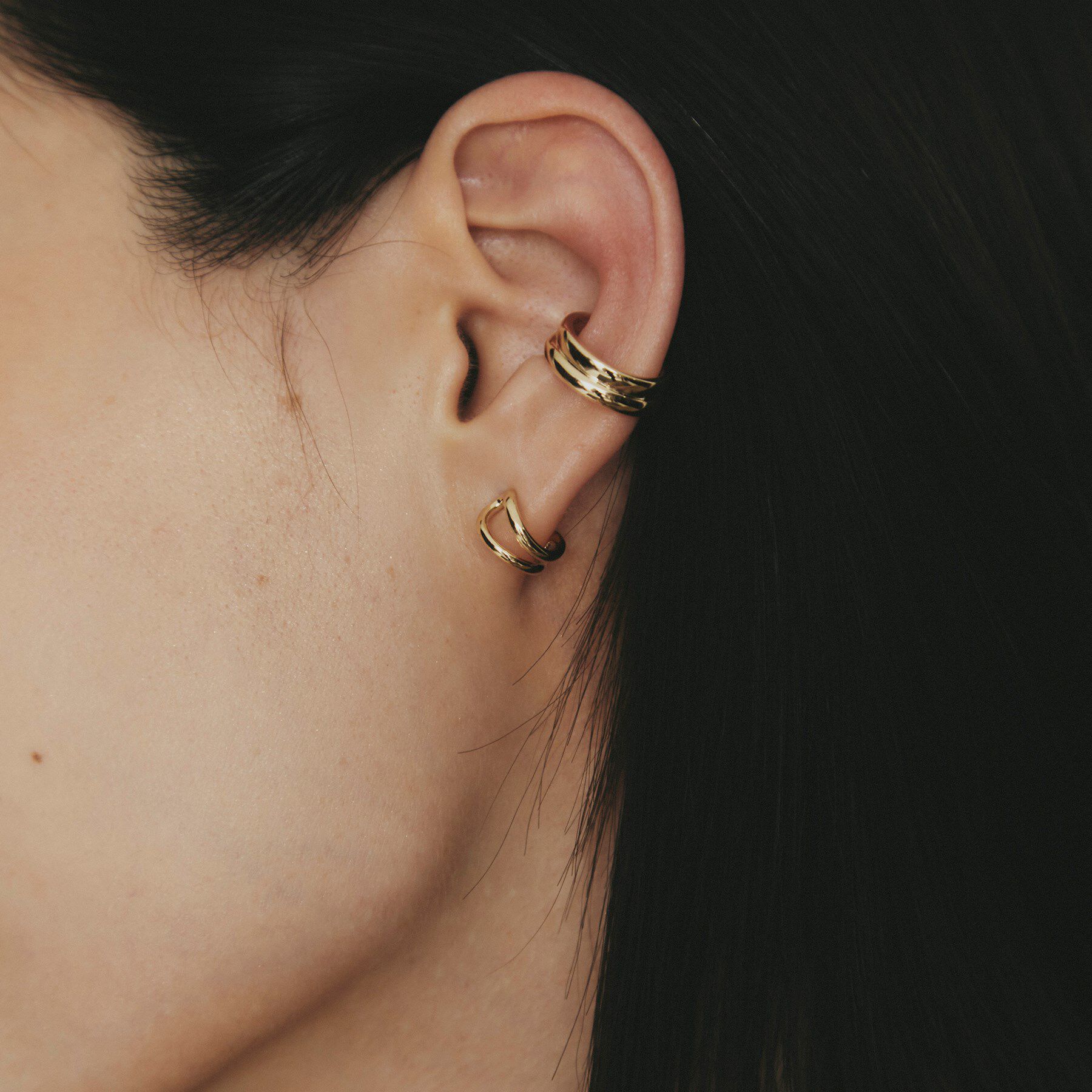 COCOSHNIK「K10甲丸ステップ イヤーカフ」|イヤリング|