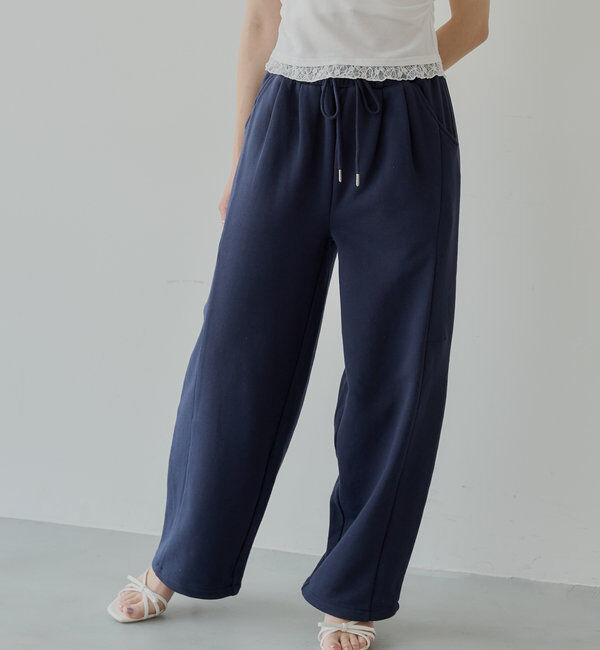  「カーブデザインドロストスウェットパンツ」|チノ|