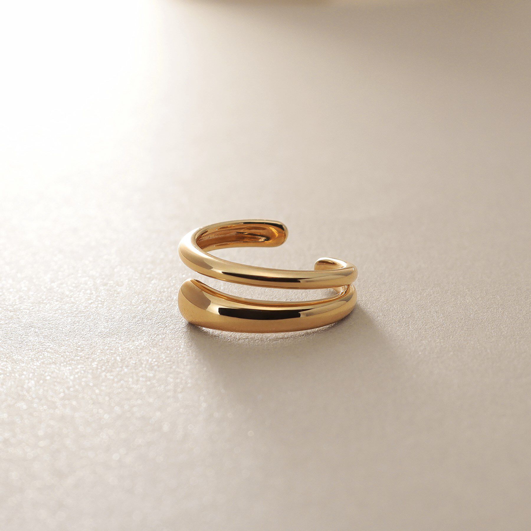 COCOSHNIK「K10ニュアンスブランチ イヤーカフ」|イヤリング|