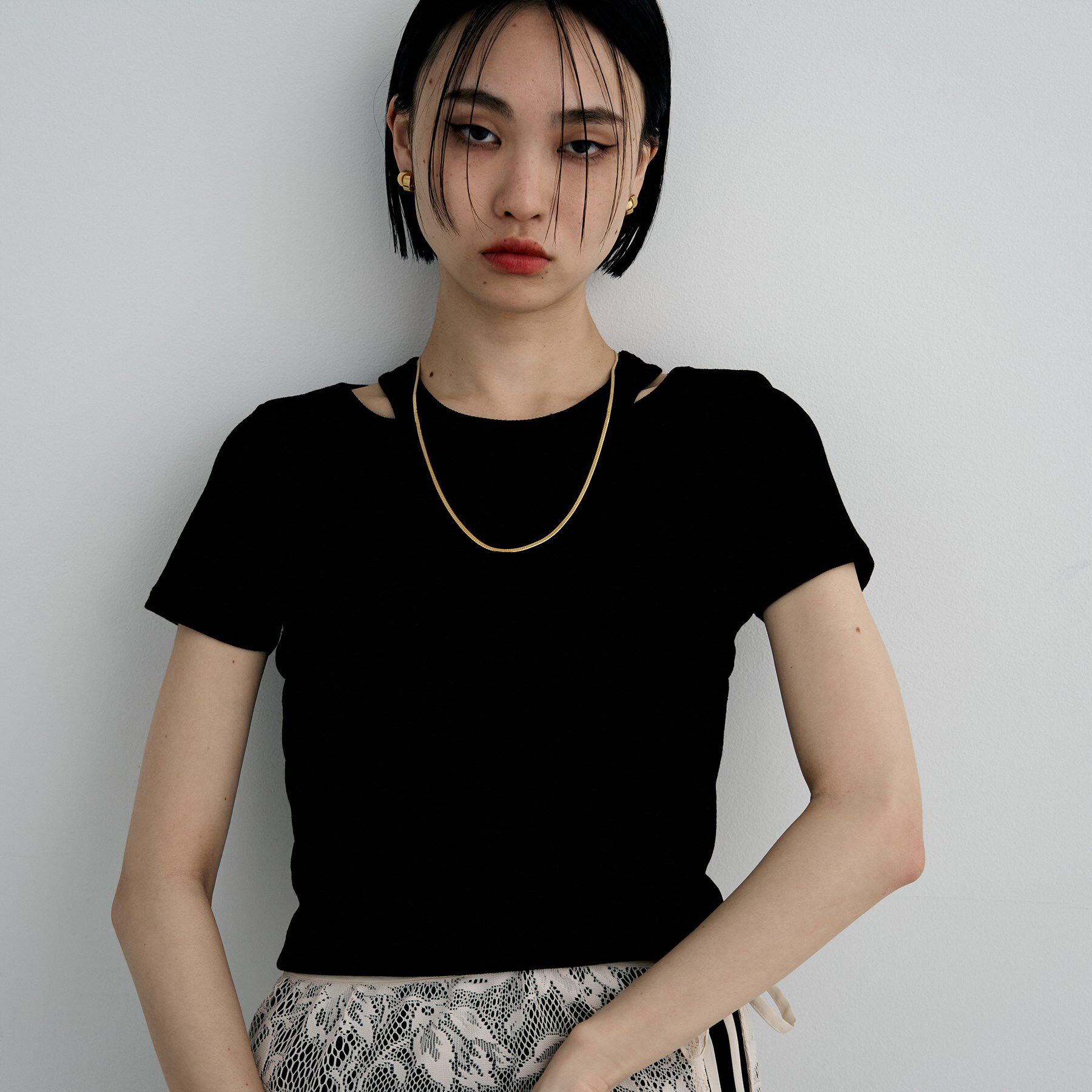 COCOSHNIK ONKITSCH「シルバー ハギーイヤリング フォールディングオーバーラップ GP」|イヤリング|