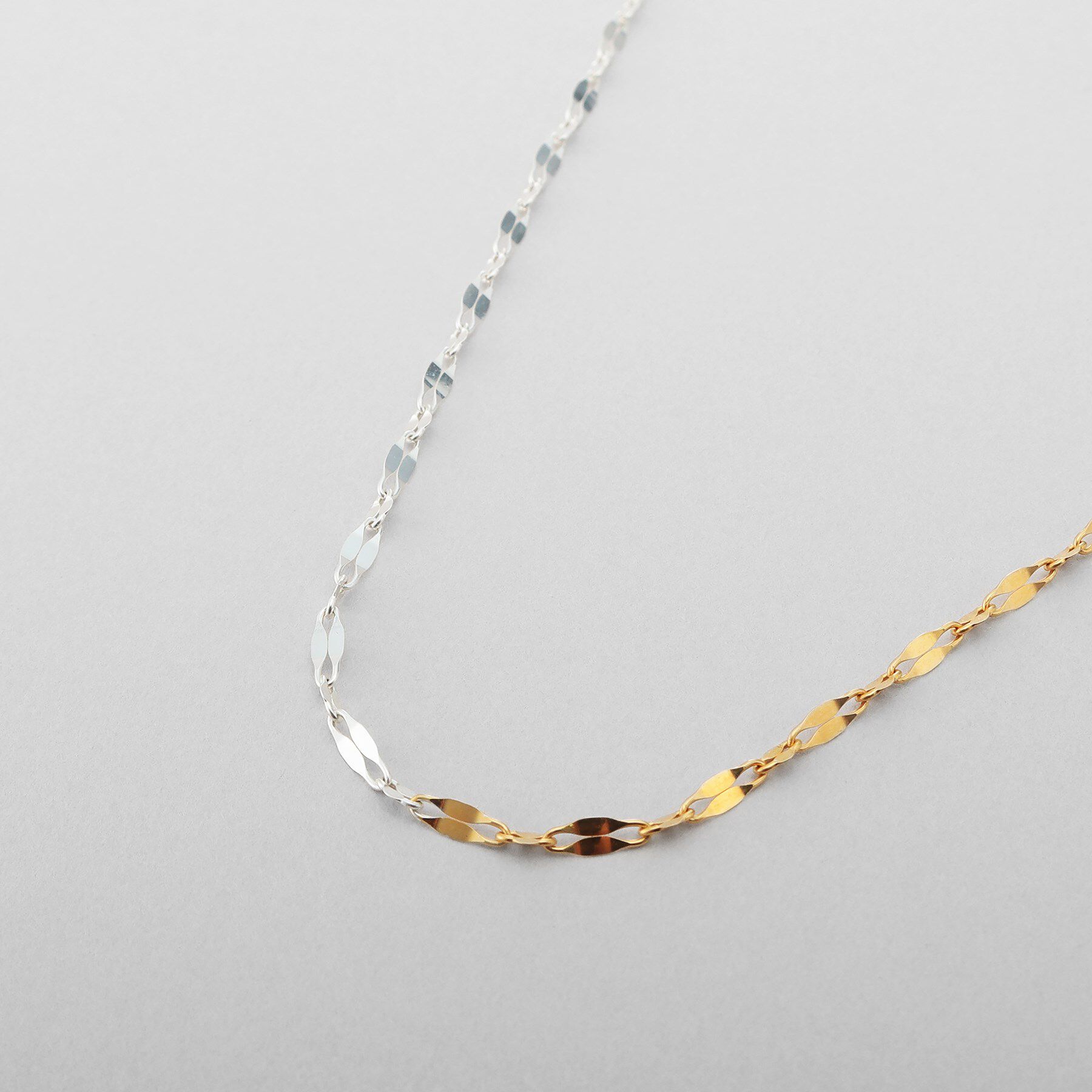 COCOSHNIK ONKITSCH「シルバー コンビカラー デュアルペタルネックレス」|ネックレス|