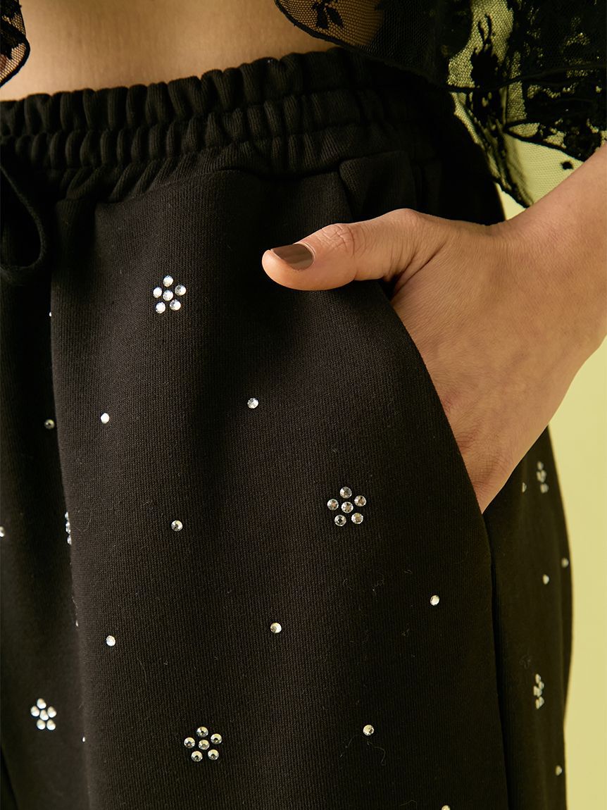 FURFUR「【限定カラー】ビジュー付きスウェットパンツ」|チノ|