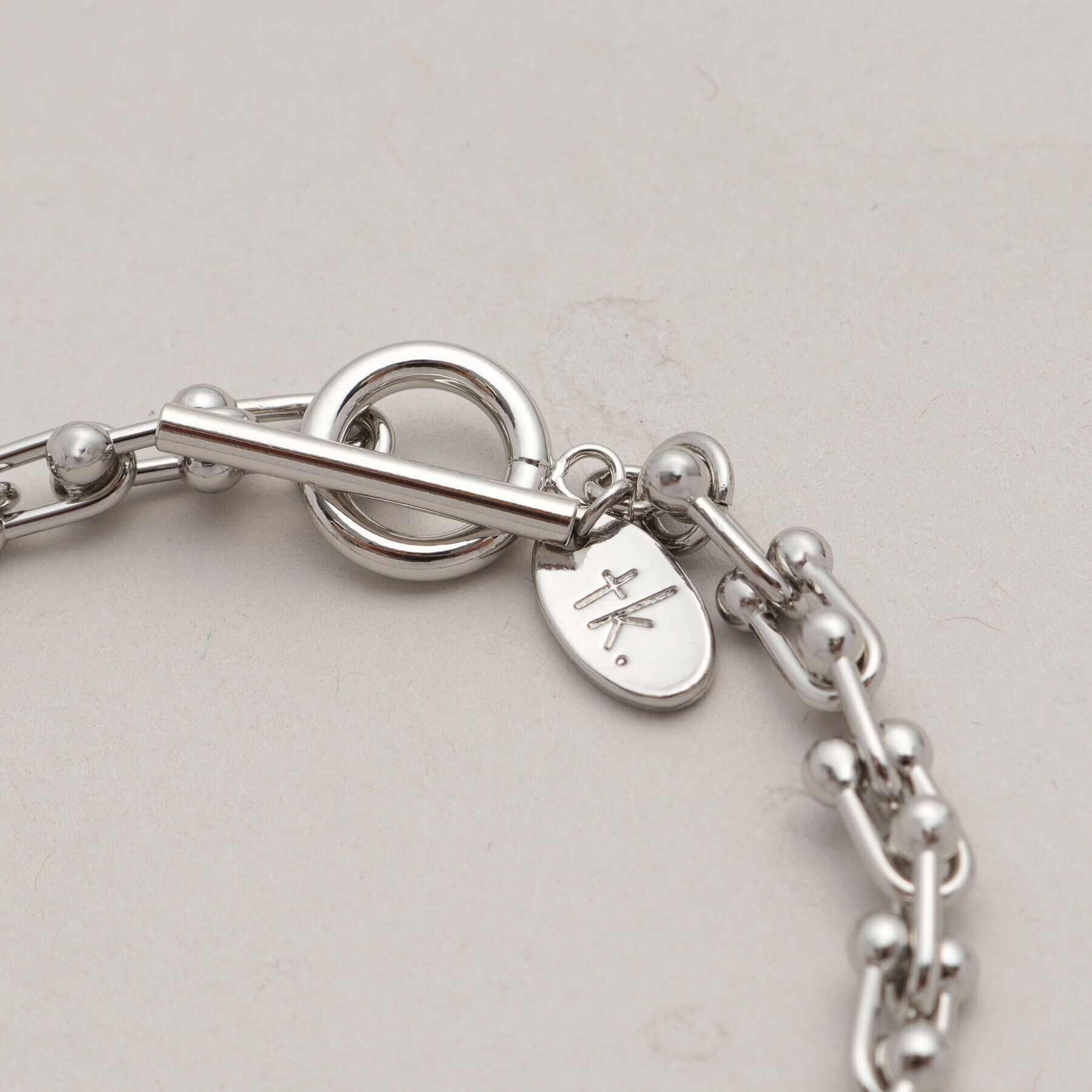 tk.TAKEO KIKUCHI「Uチェーンブレスレット」|ブレスレット・バングル|