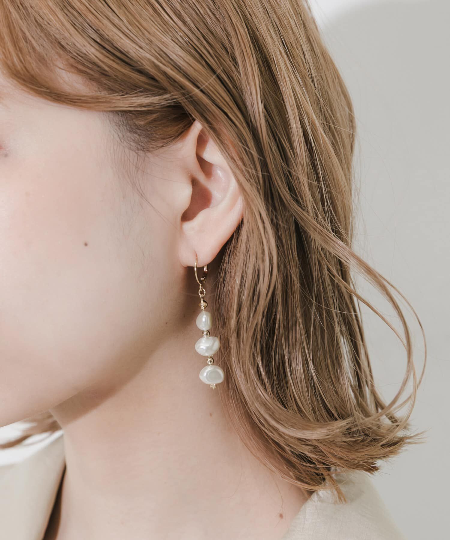 SMELLY「イビツパールスウィングフープピアス」|ピアス|