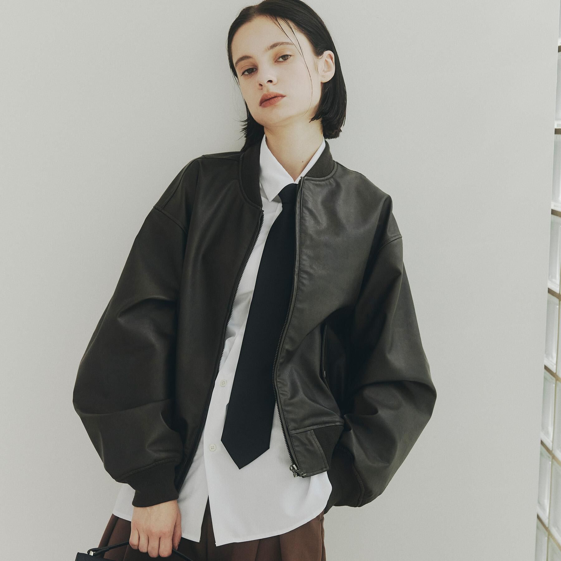 tk.TAKEO KIKUCHI「シンセティックレザー MA－1」|ブルゾン・スタジャン|