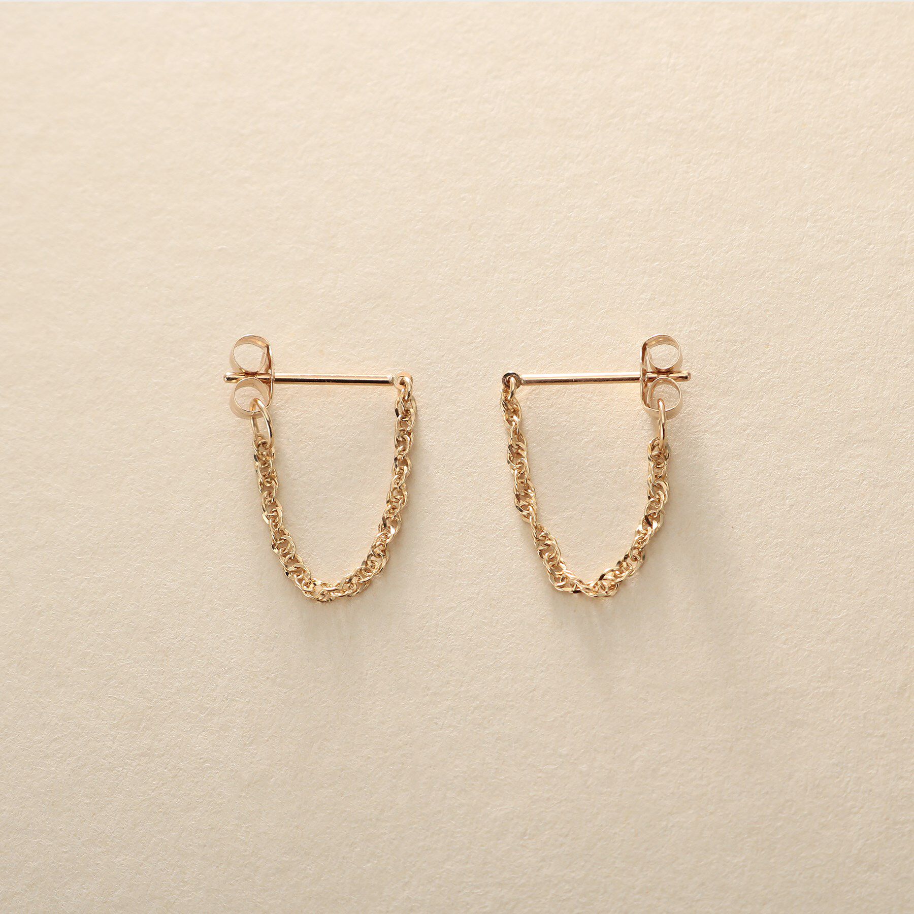 COCOSHNIK ONKITSCH「K10スクリューチェーン フープピアス」|ピアス|