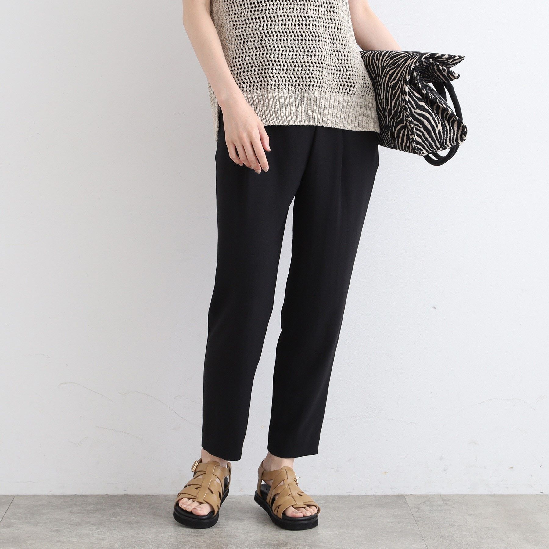 INDIVI「【洗える／UVケア／SETUP可能】ラップ風テーパードパンツ」|その他|ブラック(019)