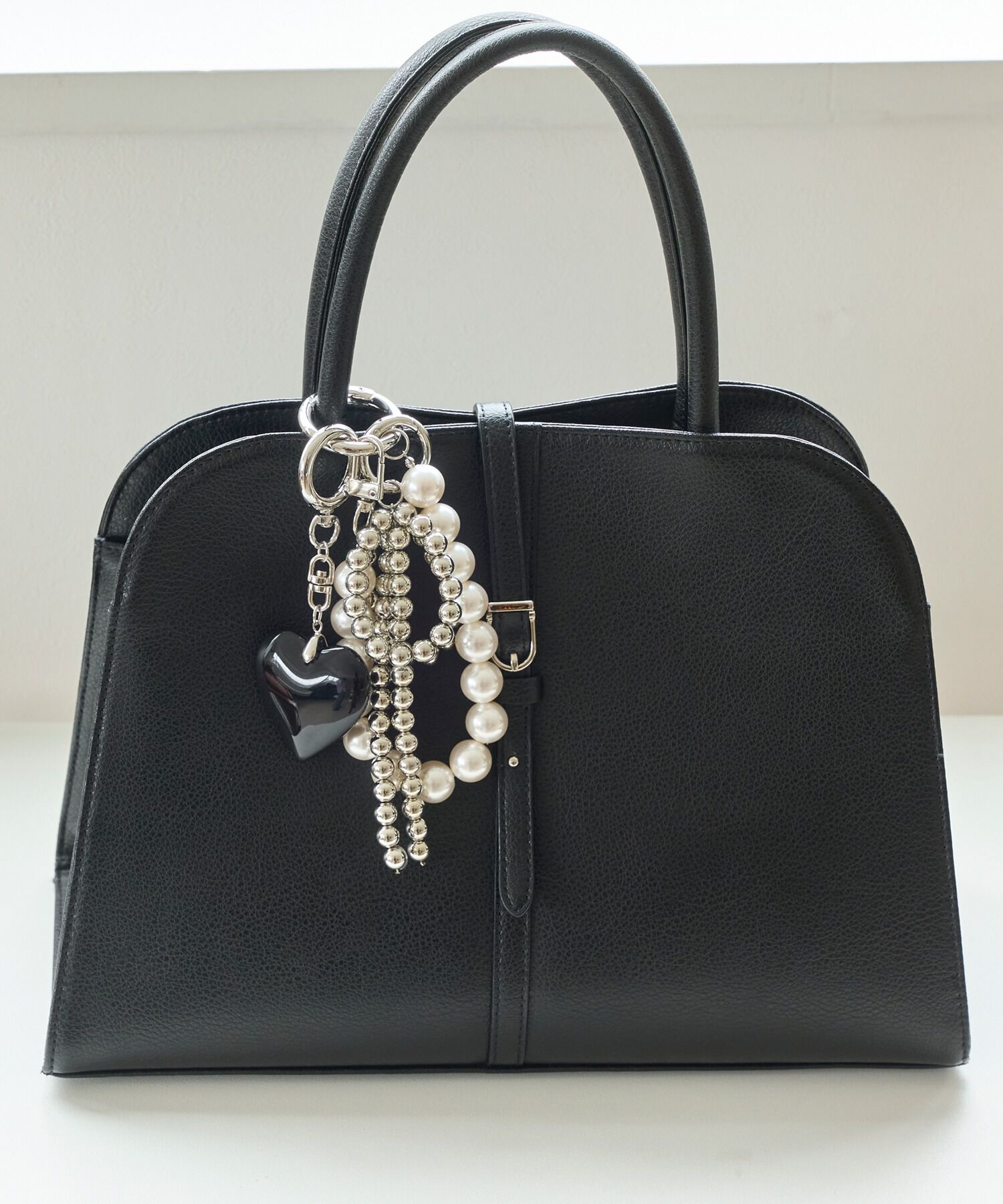 Phoebe「シルバーボールリボンバッグチャーム」|チャーム・キーホルダー|